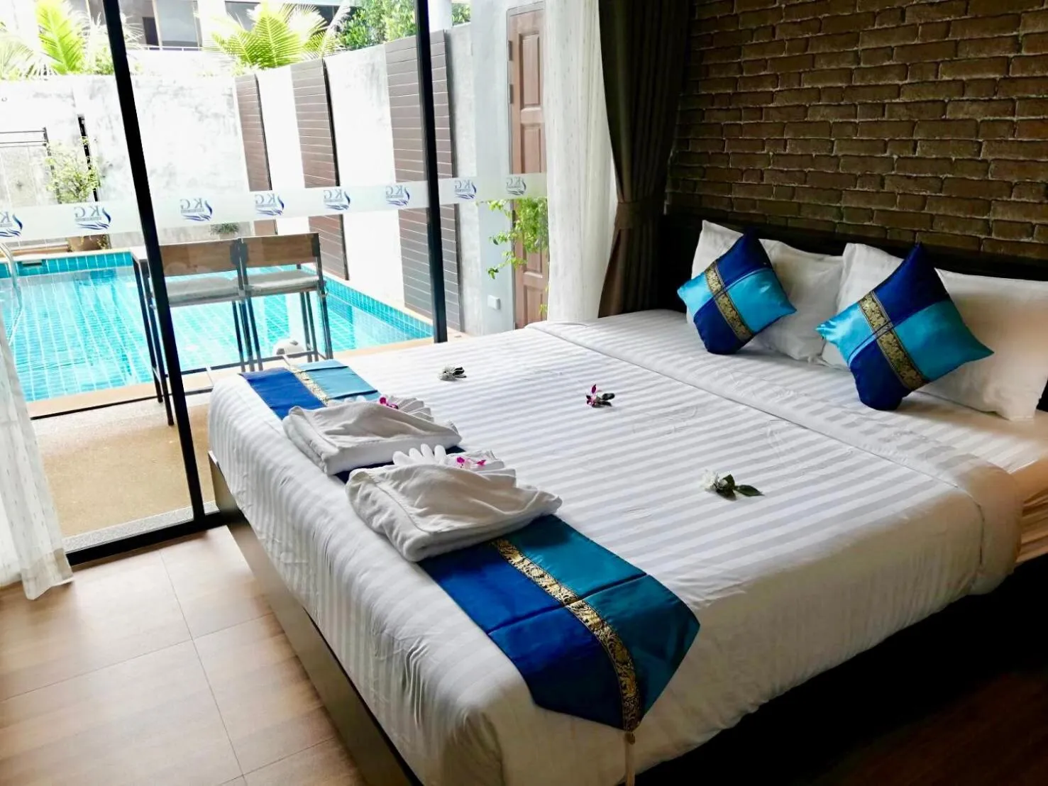 Bed in KG Private Pool Villas Soi 9
