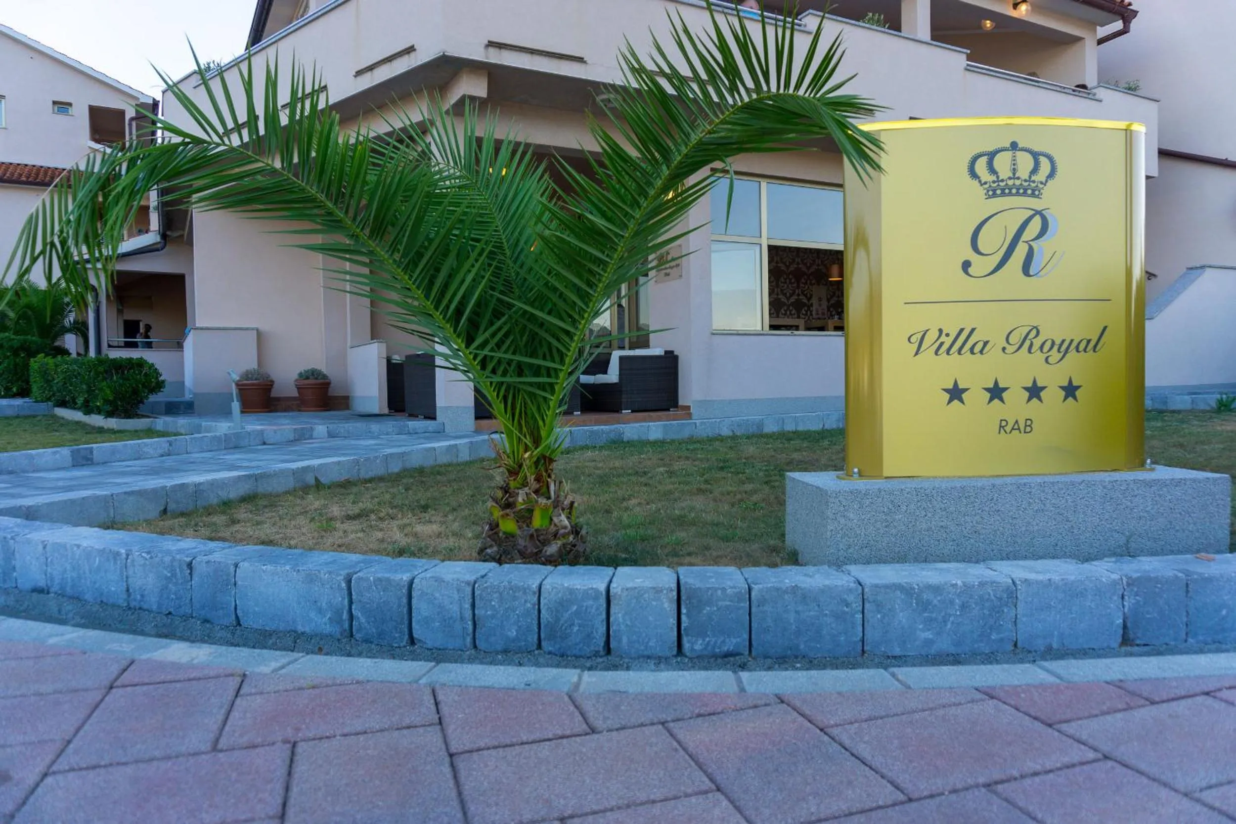 Property logo or sign in Villa Royal