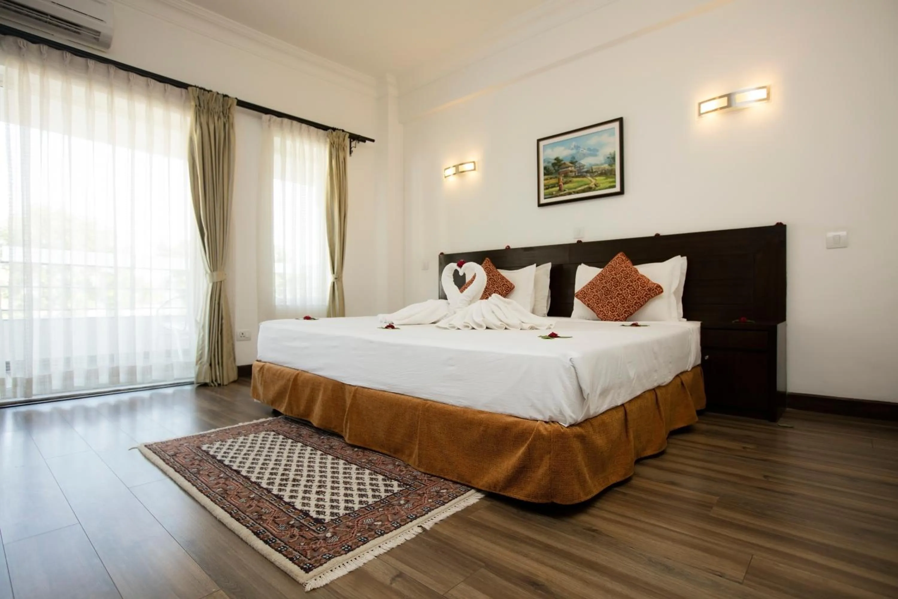 Bed in Waterfront Resort by KGH Group