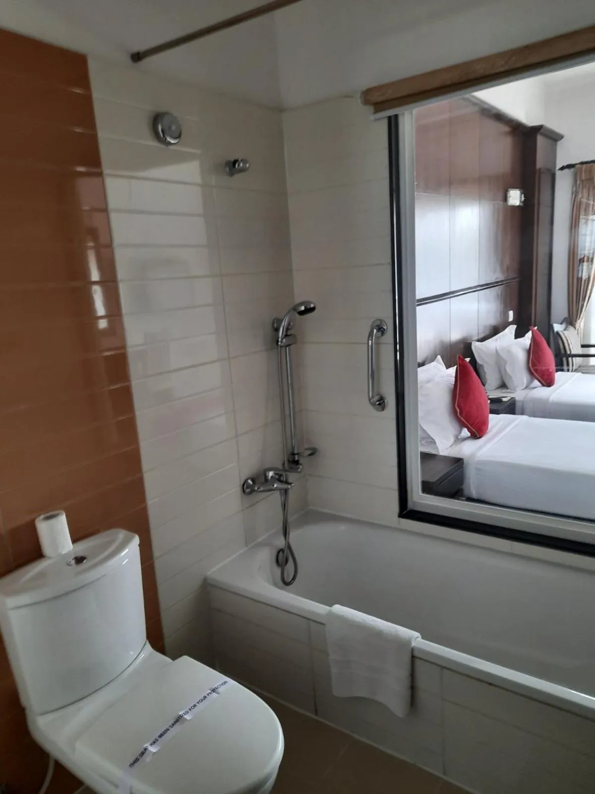 Shower, Bed in Waterfront Resort by KGH Group