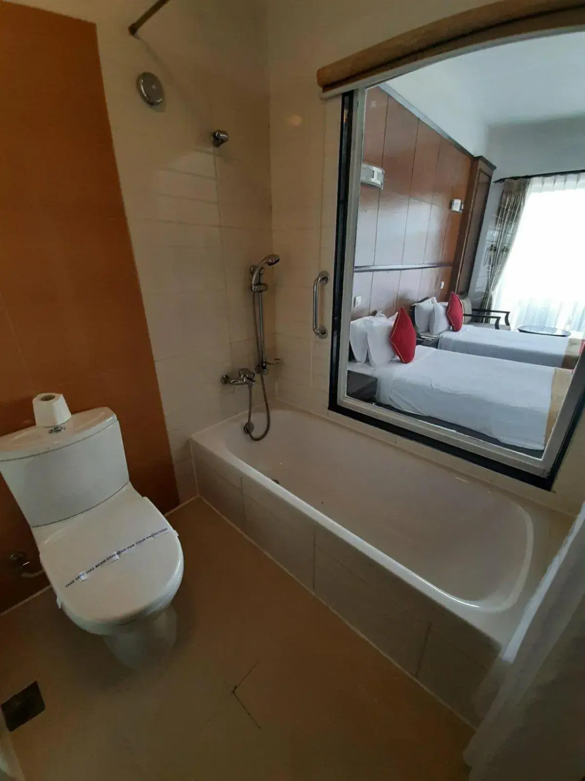 Bathroom, Bed in Waterfront Resort by KGH Group Bathroom, Bed in Waterfront Resort by KGH Group
