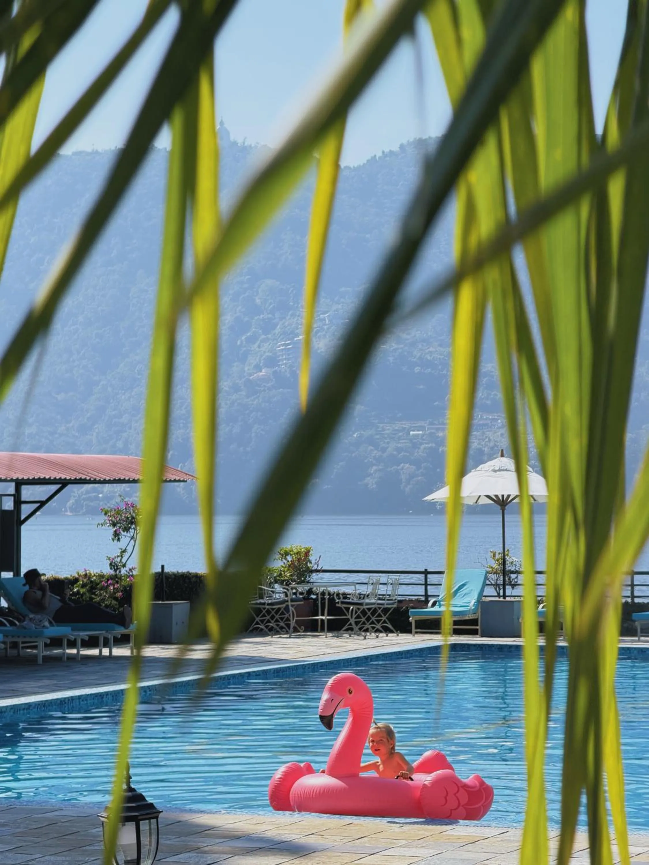 Swimming pool in Waterfront Resort by KGH Group