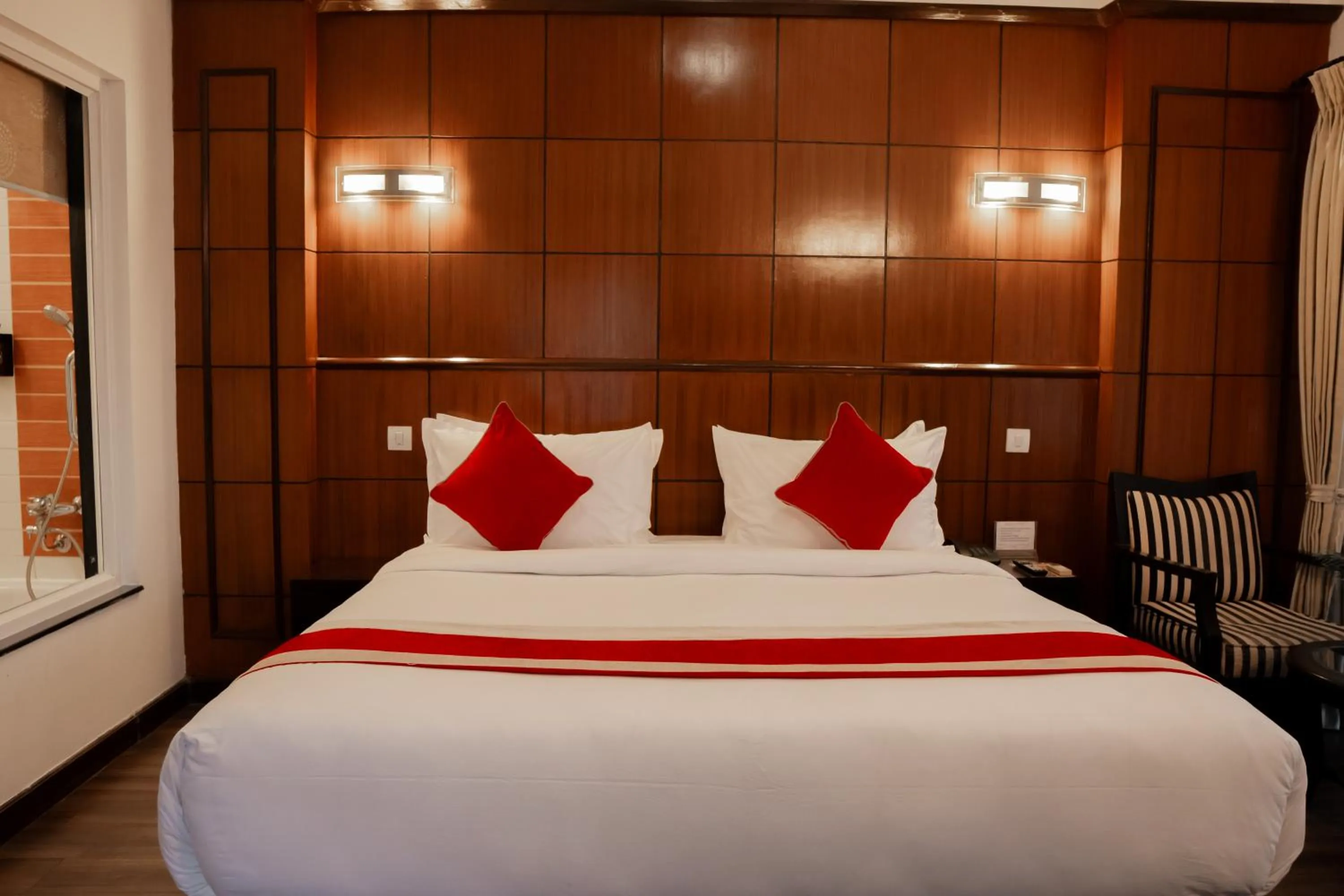 Bed in Waterfront Resort by KGH Group