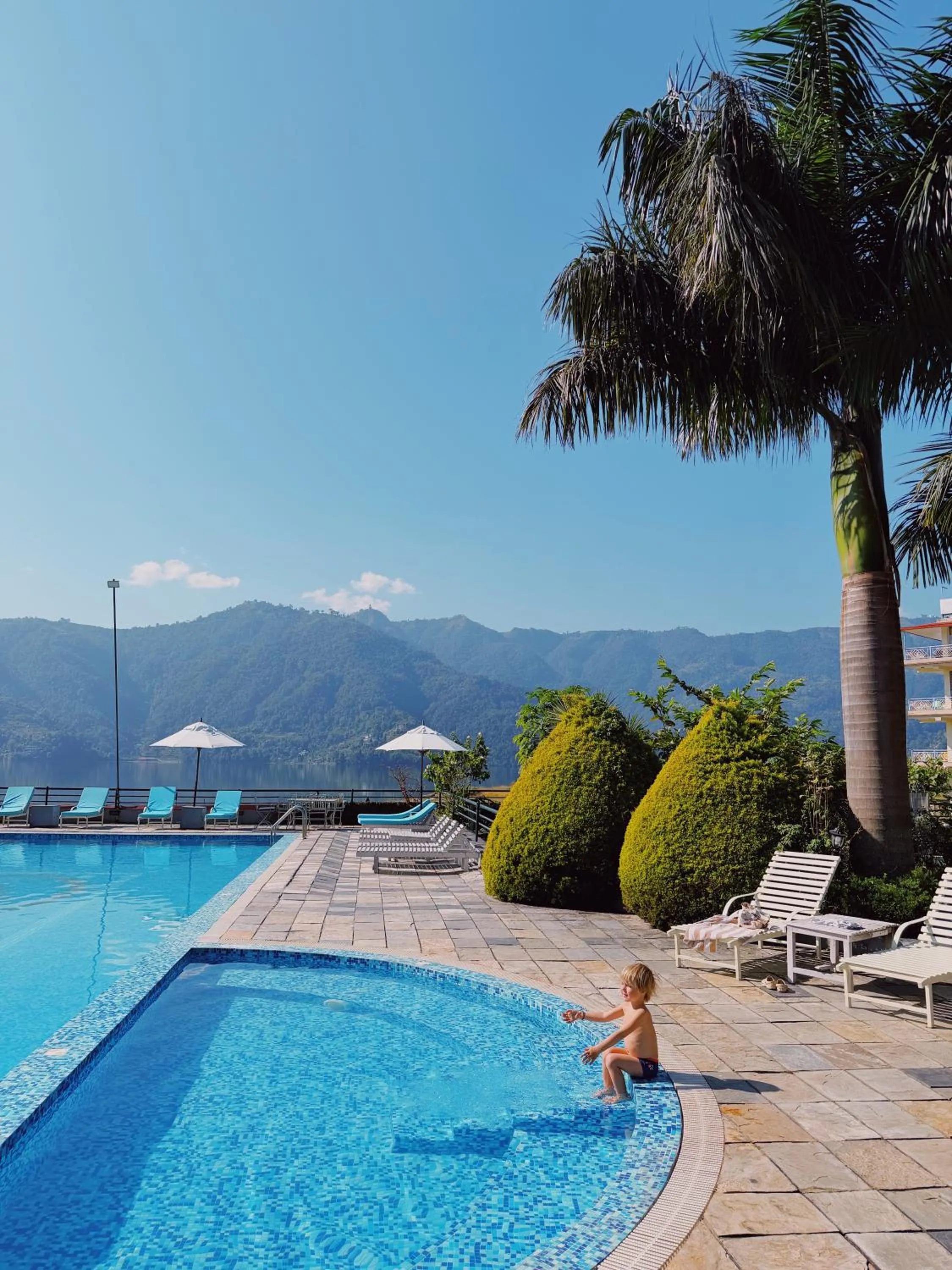 Swimming pool in Waterfront Resort by KGH Group