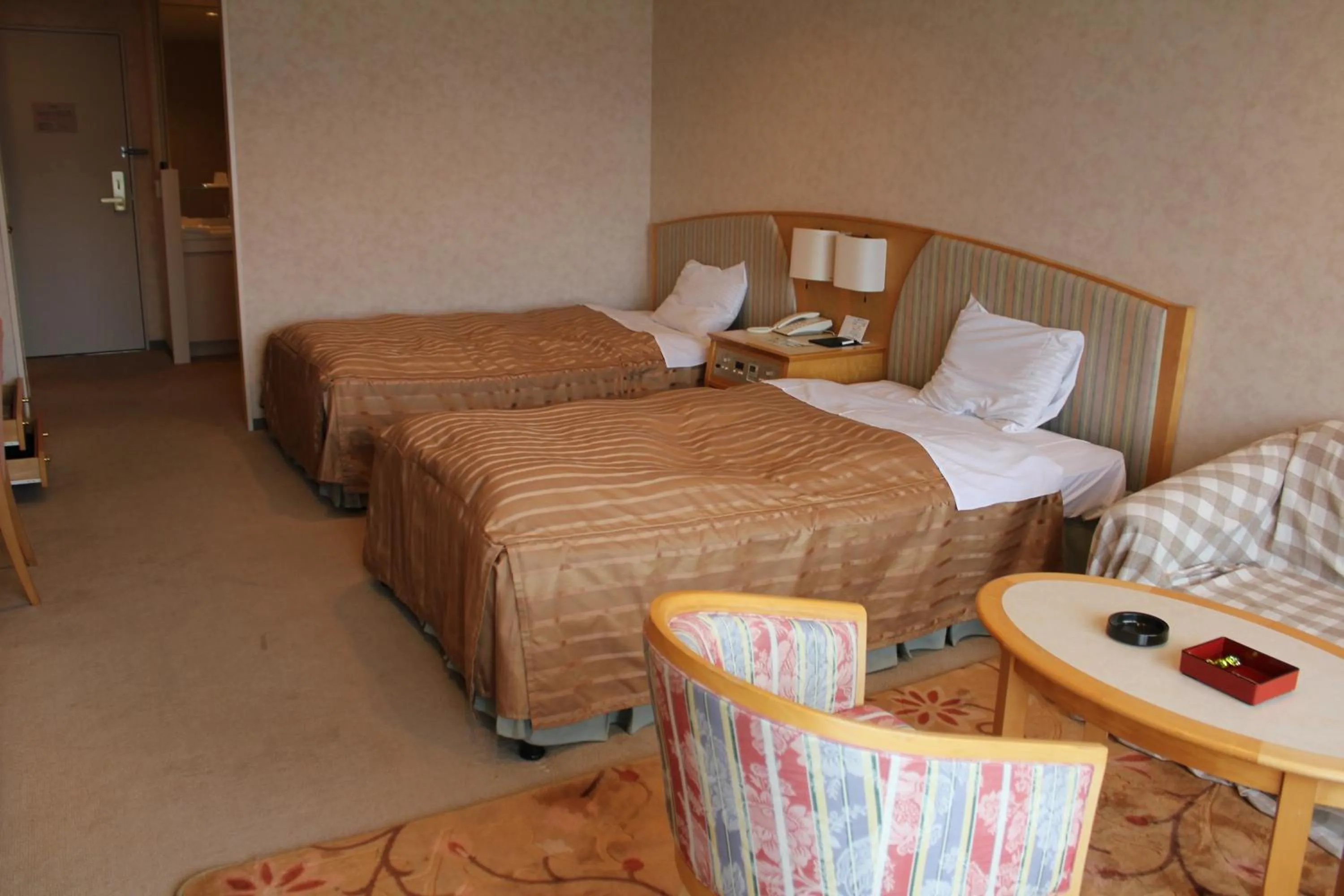 Bed in LiVEMAX RESORT Hakodate Greenpia Onuma
