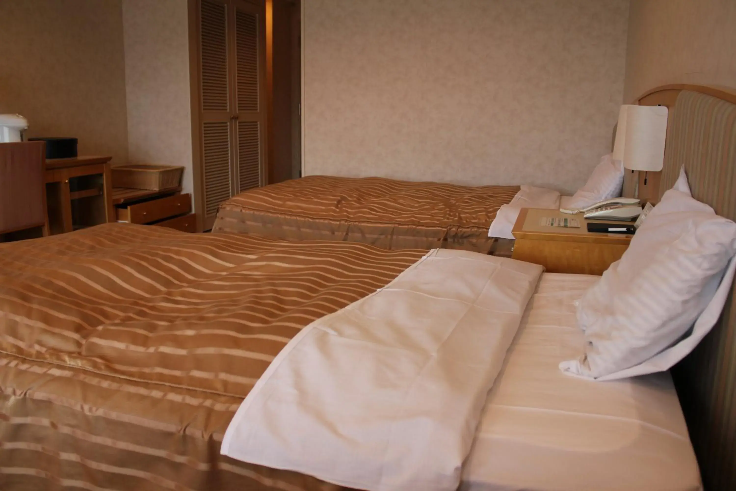 Bed in LiVEMAX RESORT Hakodate Greenpia Onuma Bed in LiVEMAX RESORT Hakodate Greenpia Onuma