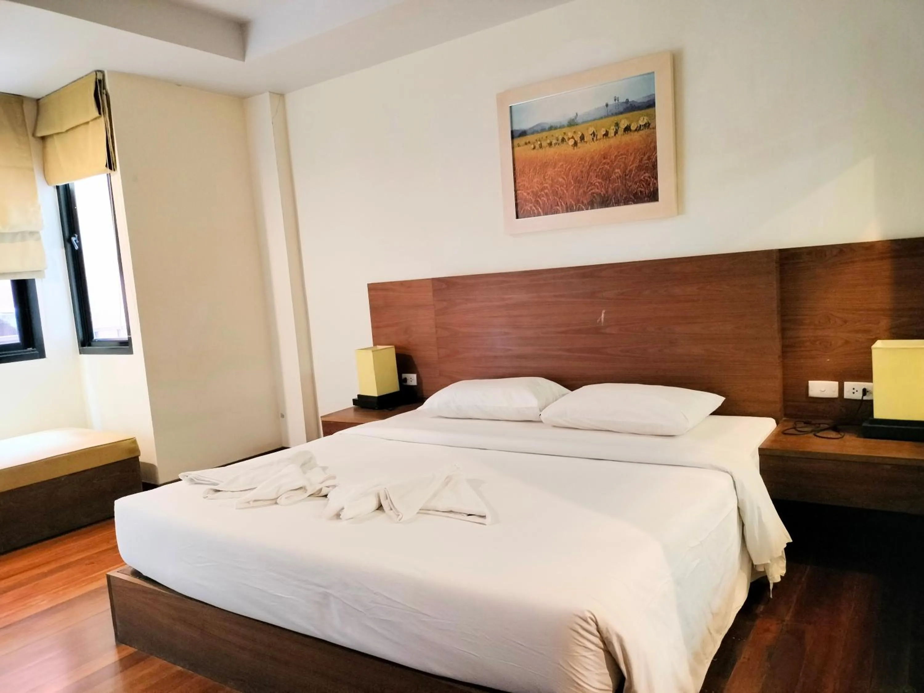 Bed in Baan Saikao Plaza Hotel & Service Apartment