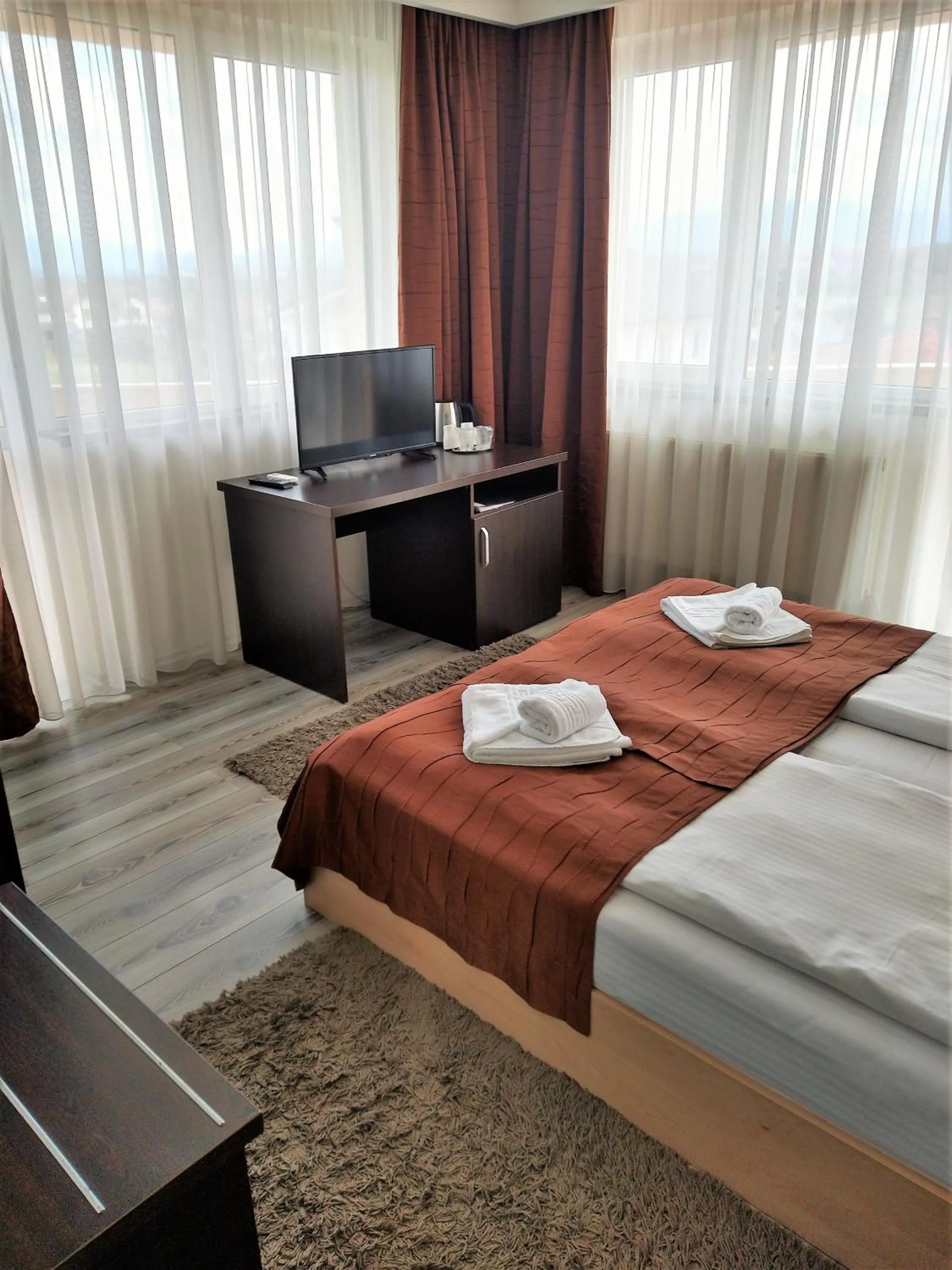 Bed in Pensiunea Carmen - Bikers Friendly Nest