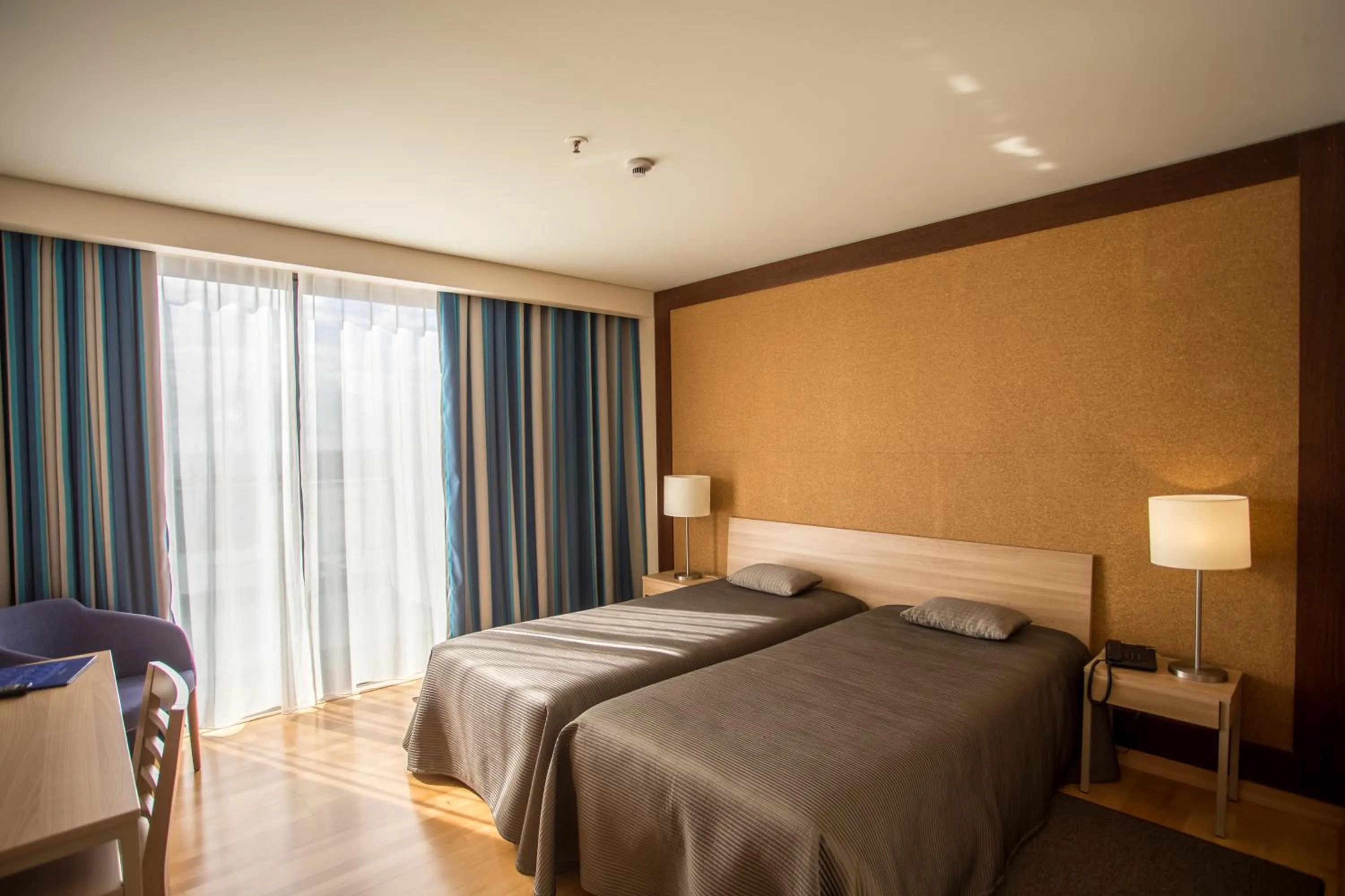 Bed in Antillia Hotel