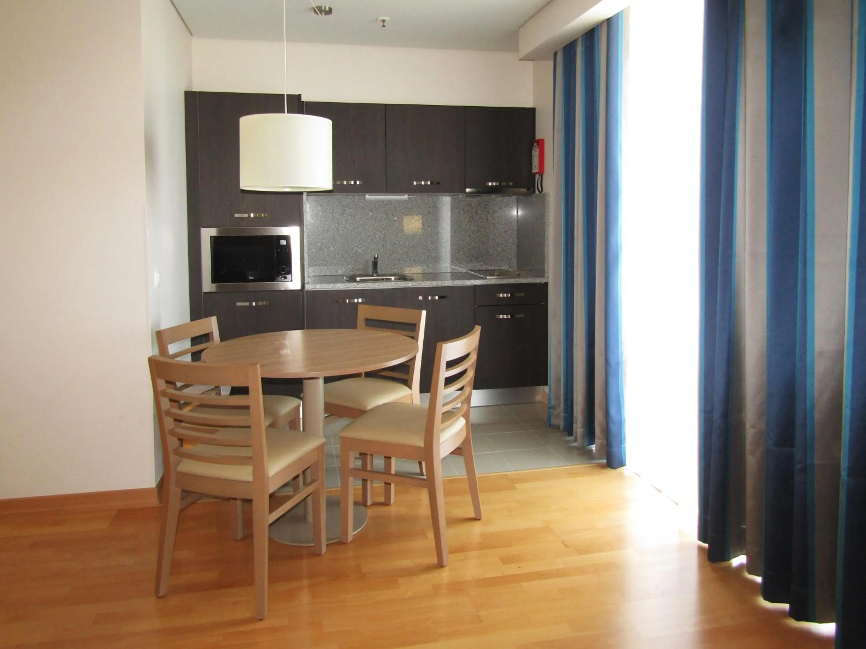 Kitchen or kitchenette in Antillia Hotel