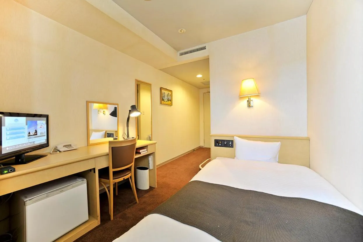 Bed in Yamagata Kokusai Hotel