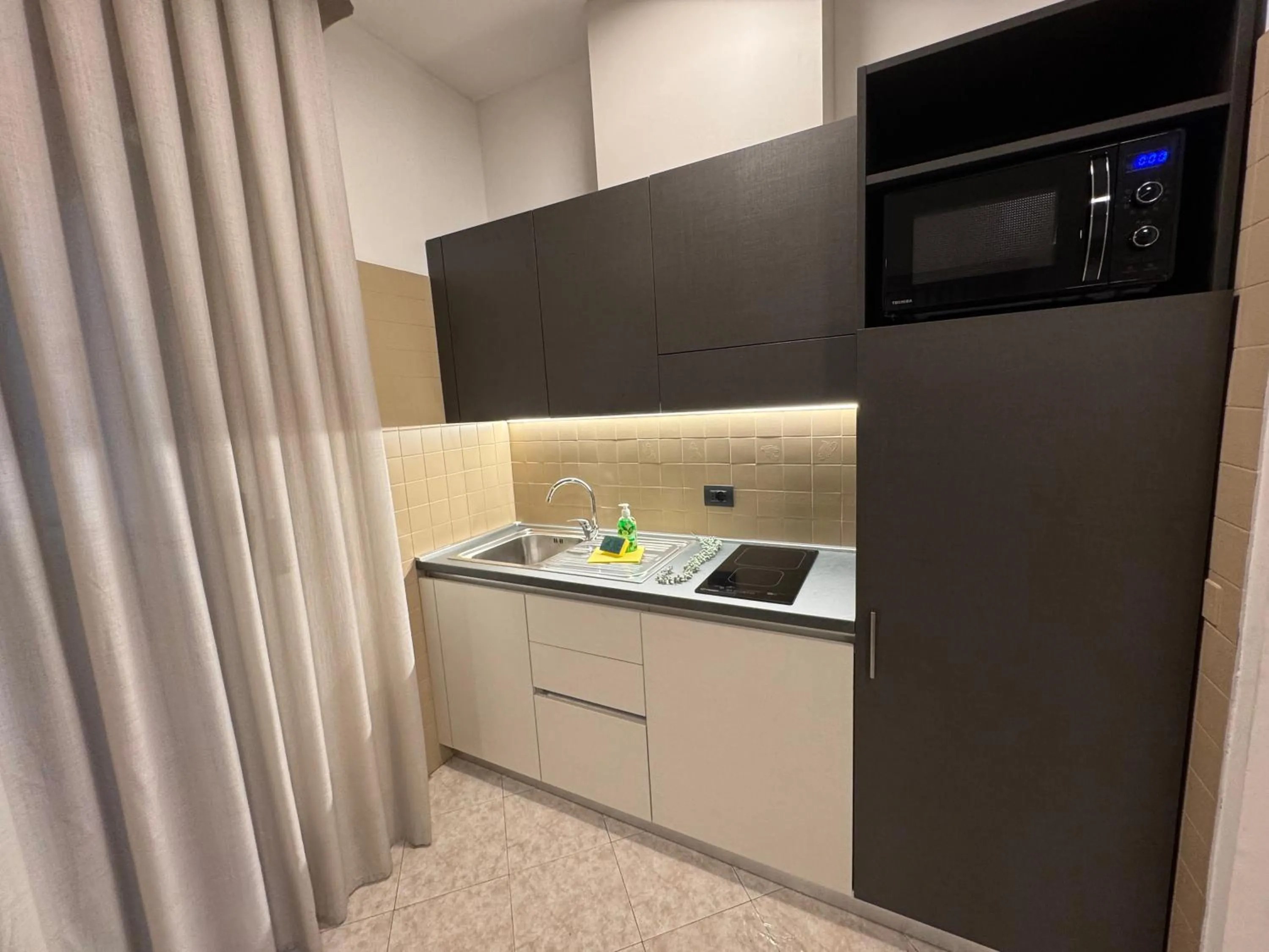 Kitchen or kitchenette in Residence le Spiagge