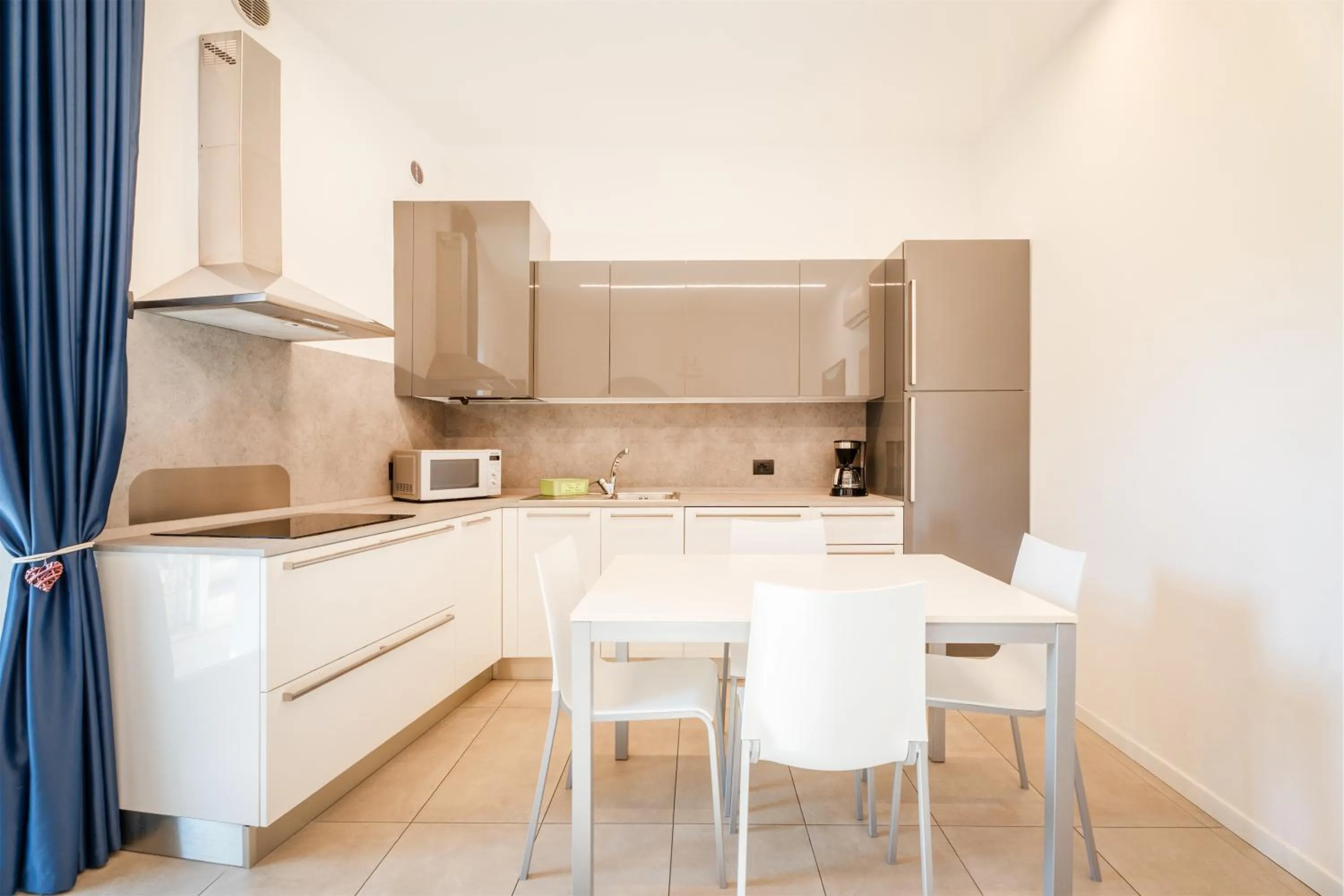 Kitchen or kitchenette in Residence Villa degli Aranci
