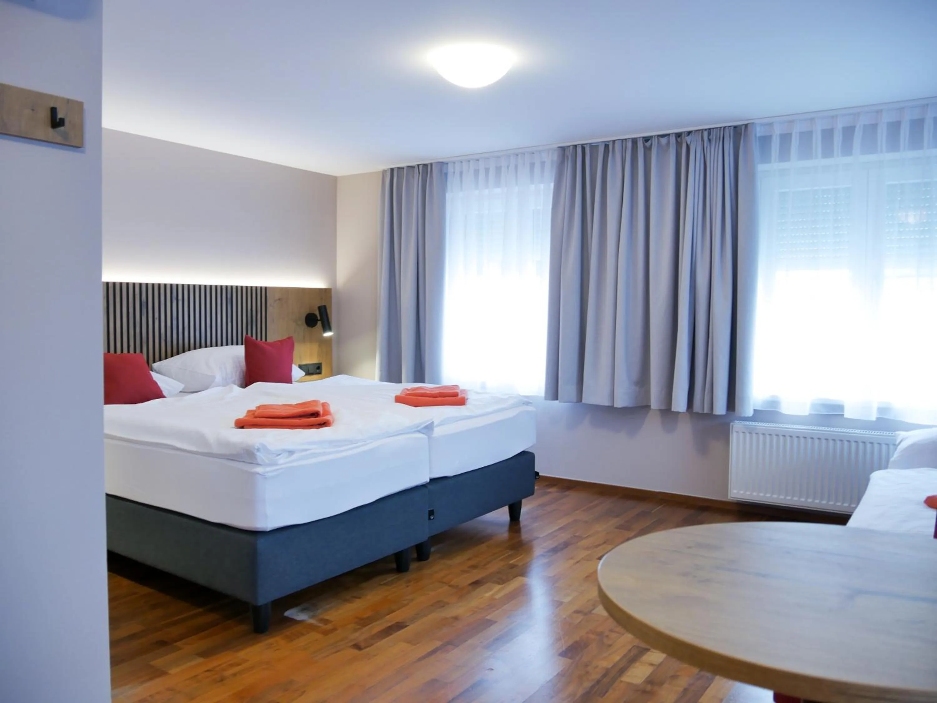 Bed in Hotel Linde-Sinohaus