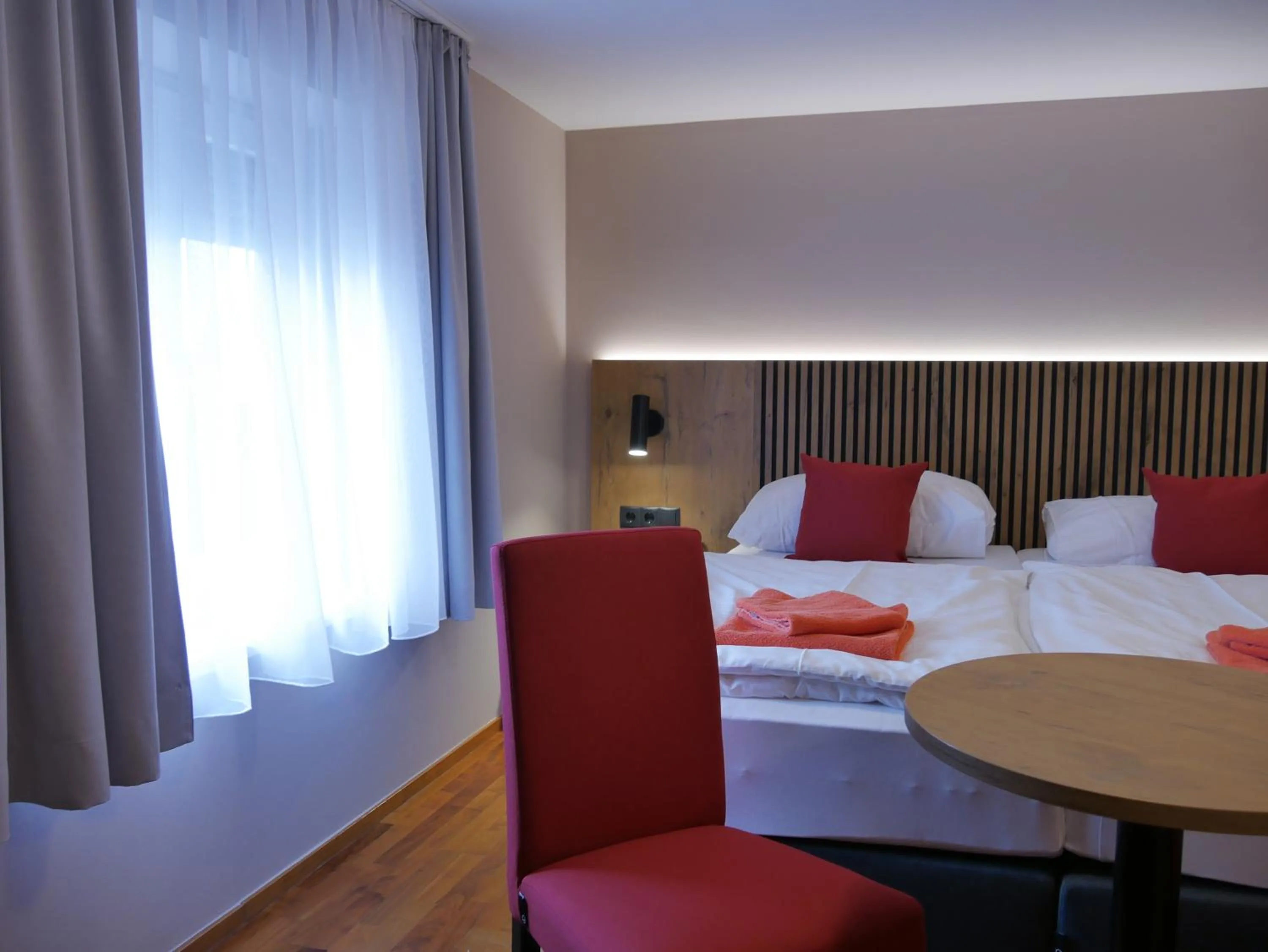 Bed in Hotel Linde-Sinohaus