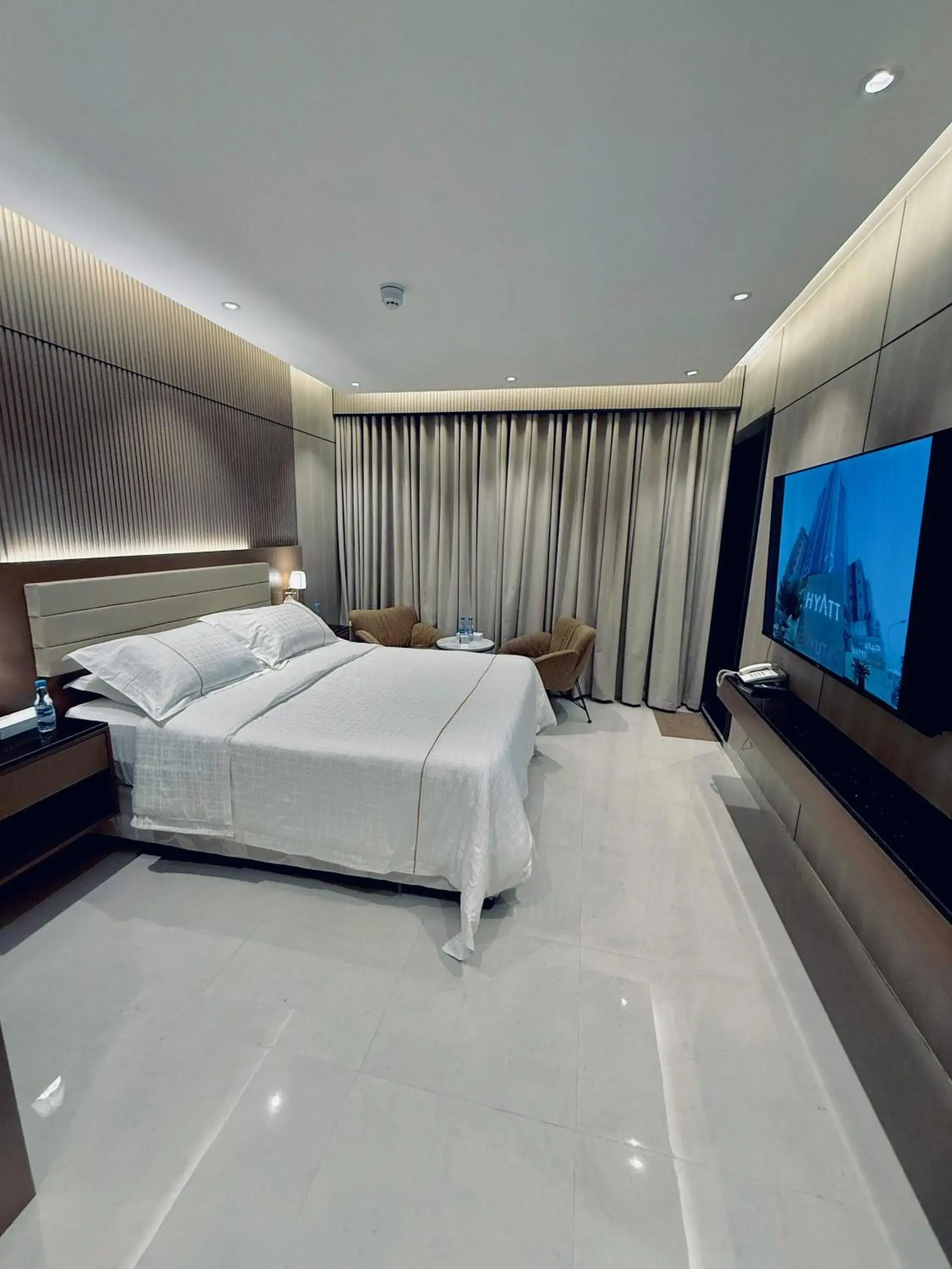 Photo of the whole room, Bed in Hyatt Buyutat Serviced Apartments Photo of the whole room, Bed in Hyatt Buyutat Serviced Apartments