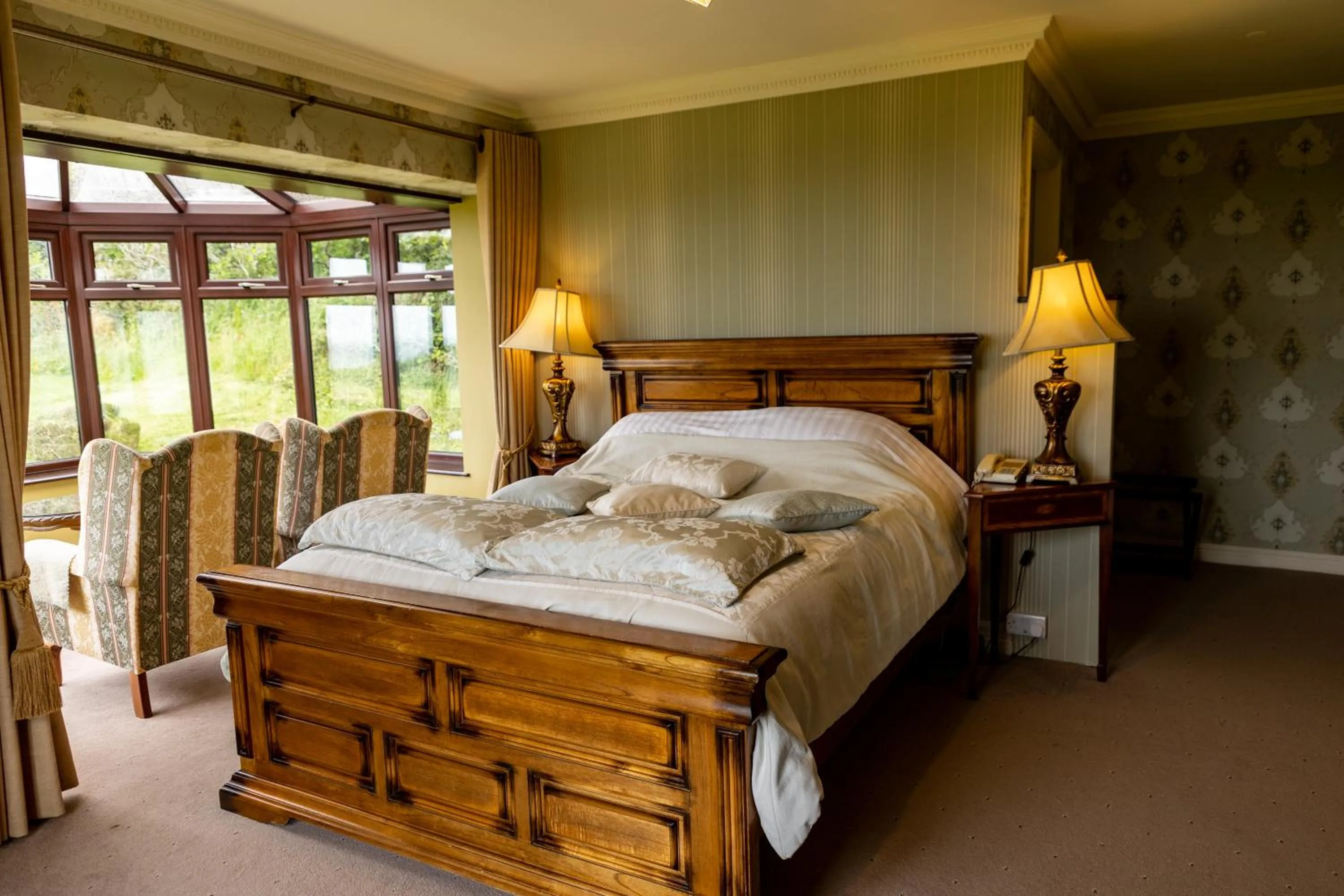 Bed in Ballinalacken Castle Country House Hotel