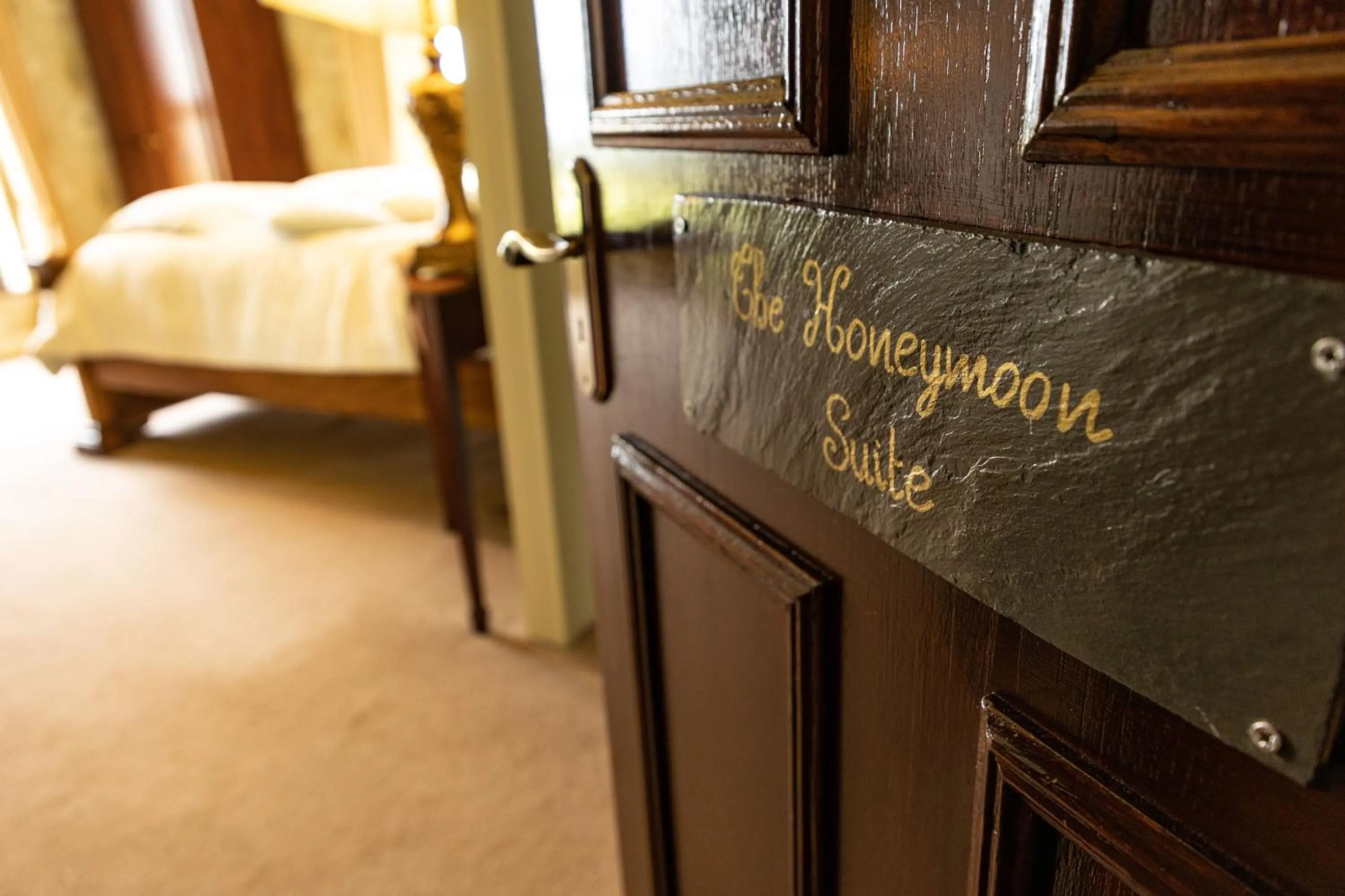 Bed in Ballinalacken Castle Country House Hotel