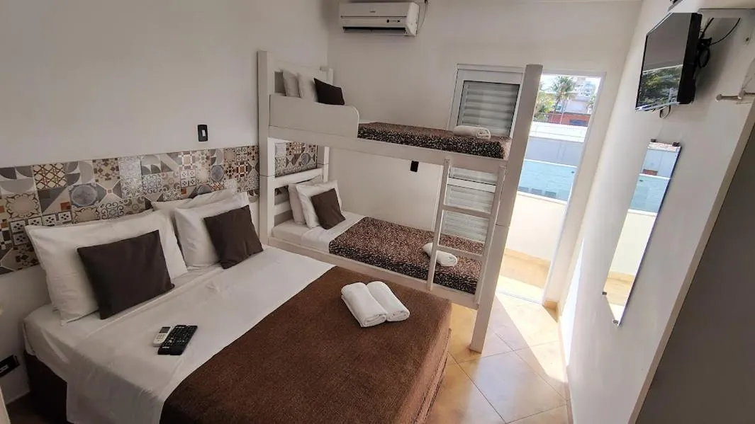 Photo of the whole room, Bed in Hotel Pousada Iracemar - Piscina Aquecida