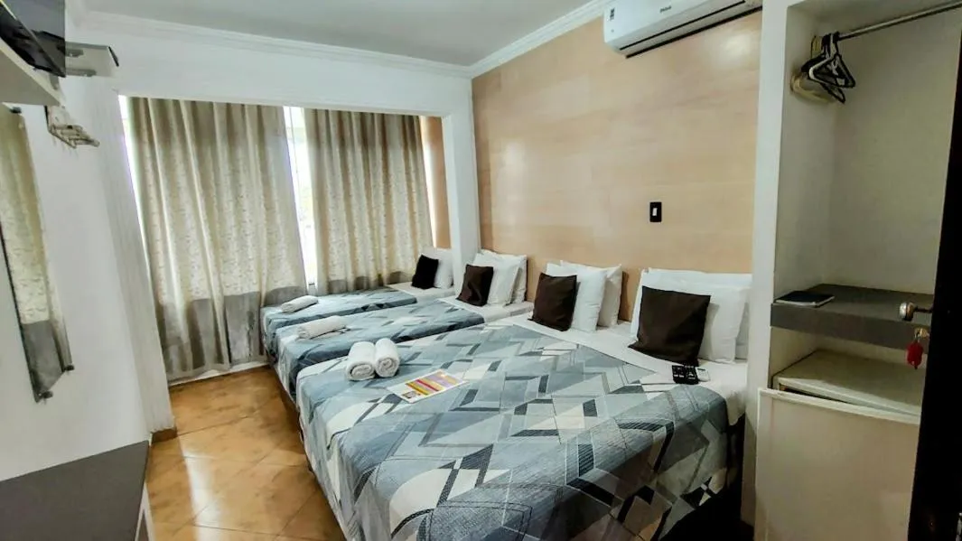 Photo of the whole room, Bed in Hotel Pousada Iracemar - Piscina Aquecida