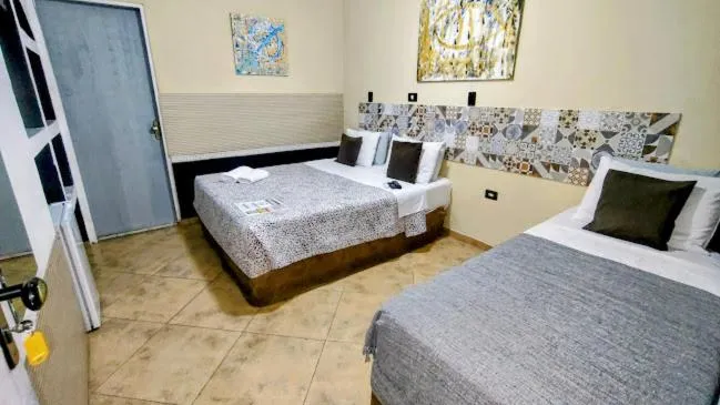 Photo of the whole room, Bed in Hotel Pousada Iracemar - Piscina Aquecida