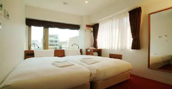 Bed in Benikea Calton Hotel Osaka Doutonbori Bed in Benikea Calton Hotel Osaka Doutonbori