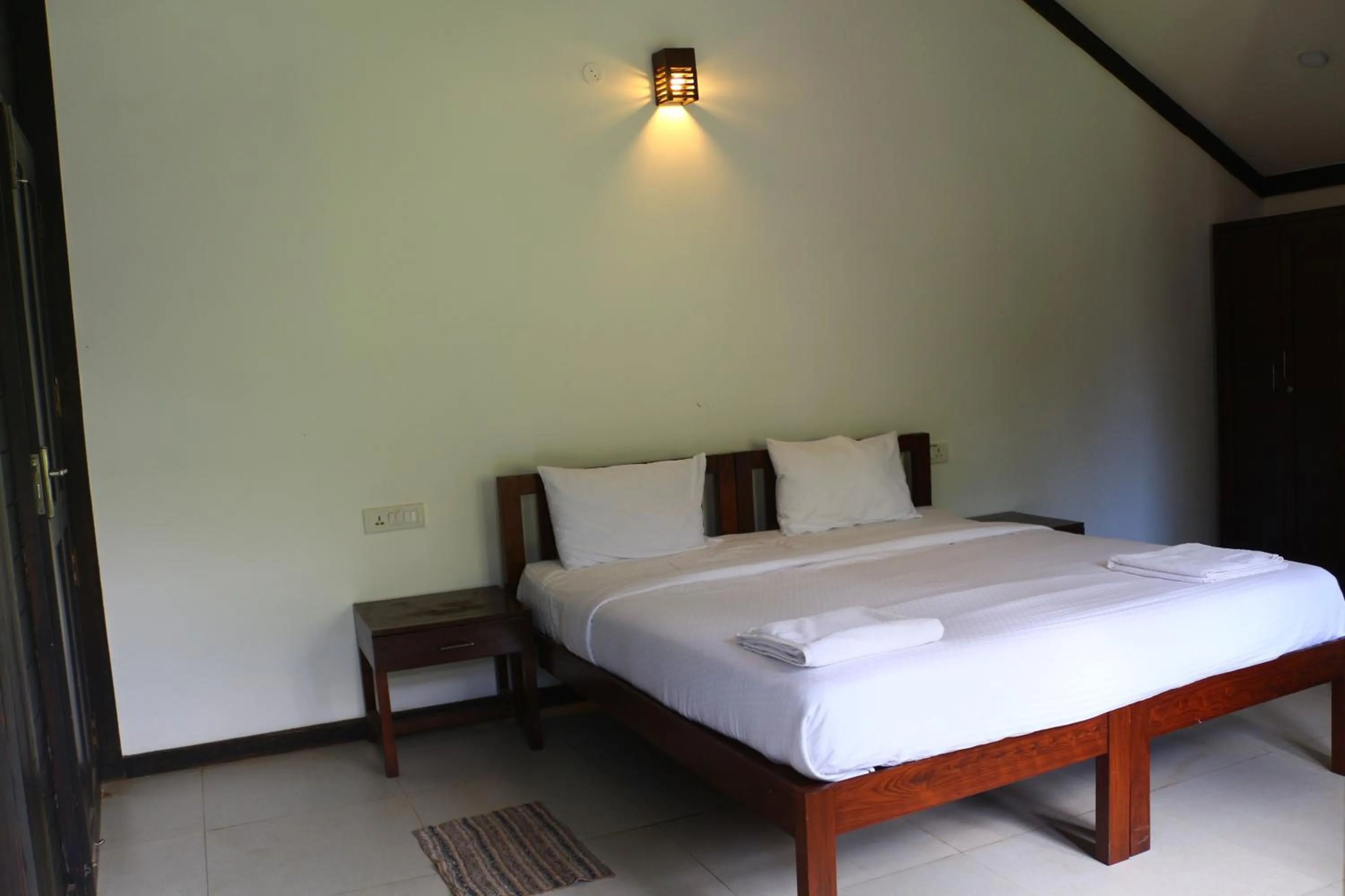 Bed in Logan Camp Ooty