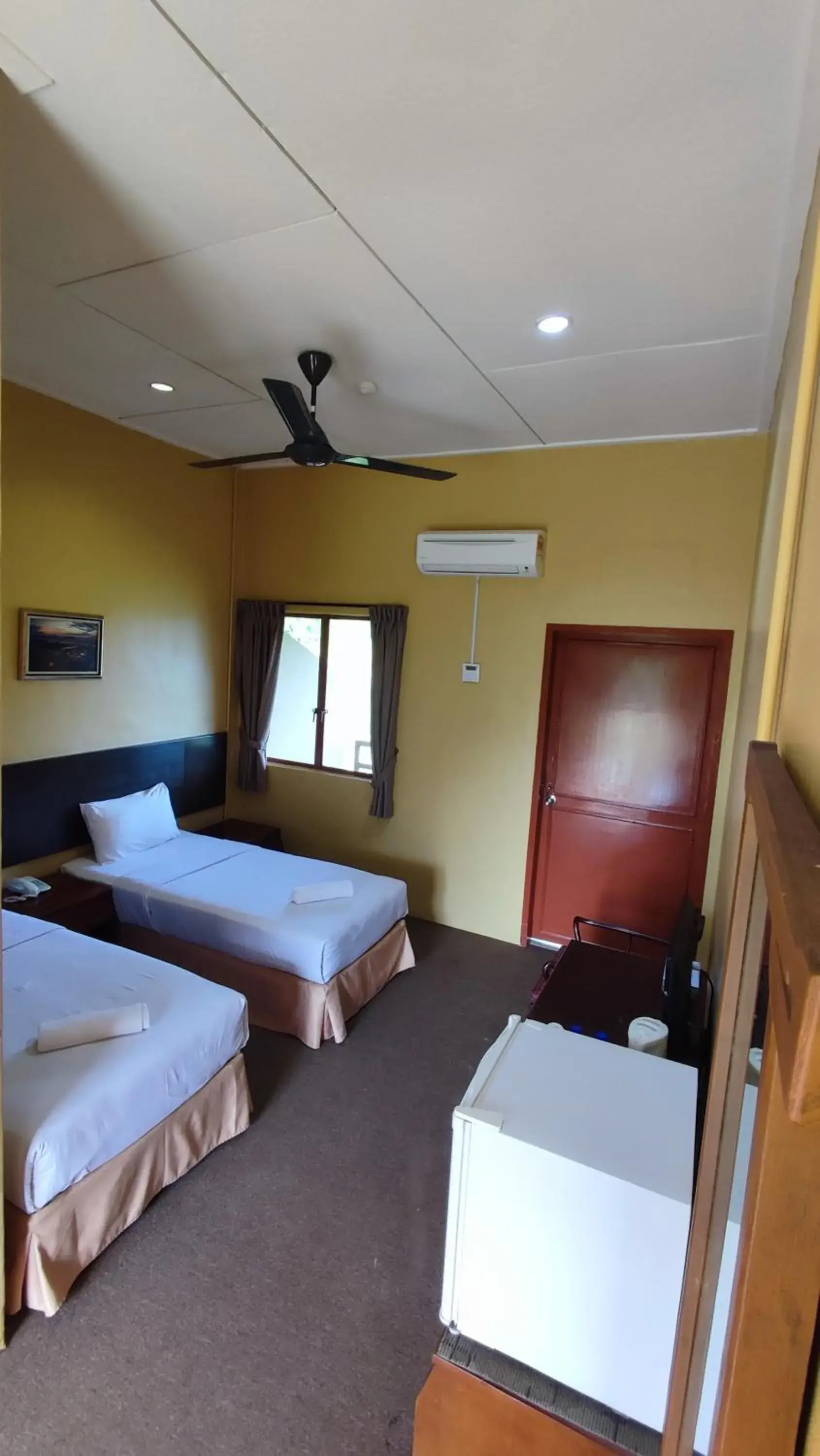 Bedroom, Bed in Mersing Merlin Inn Bedroom, Bed in Mersing Merlin Inn