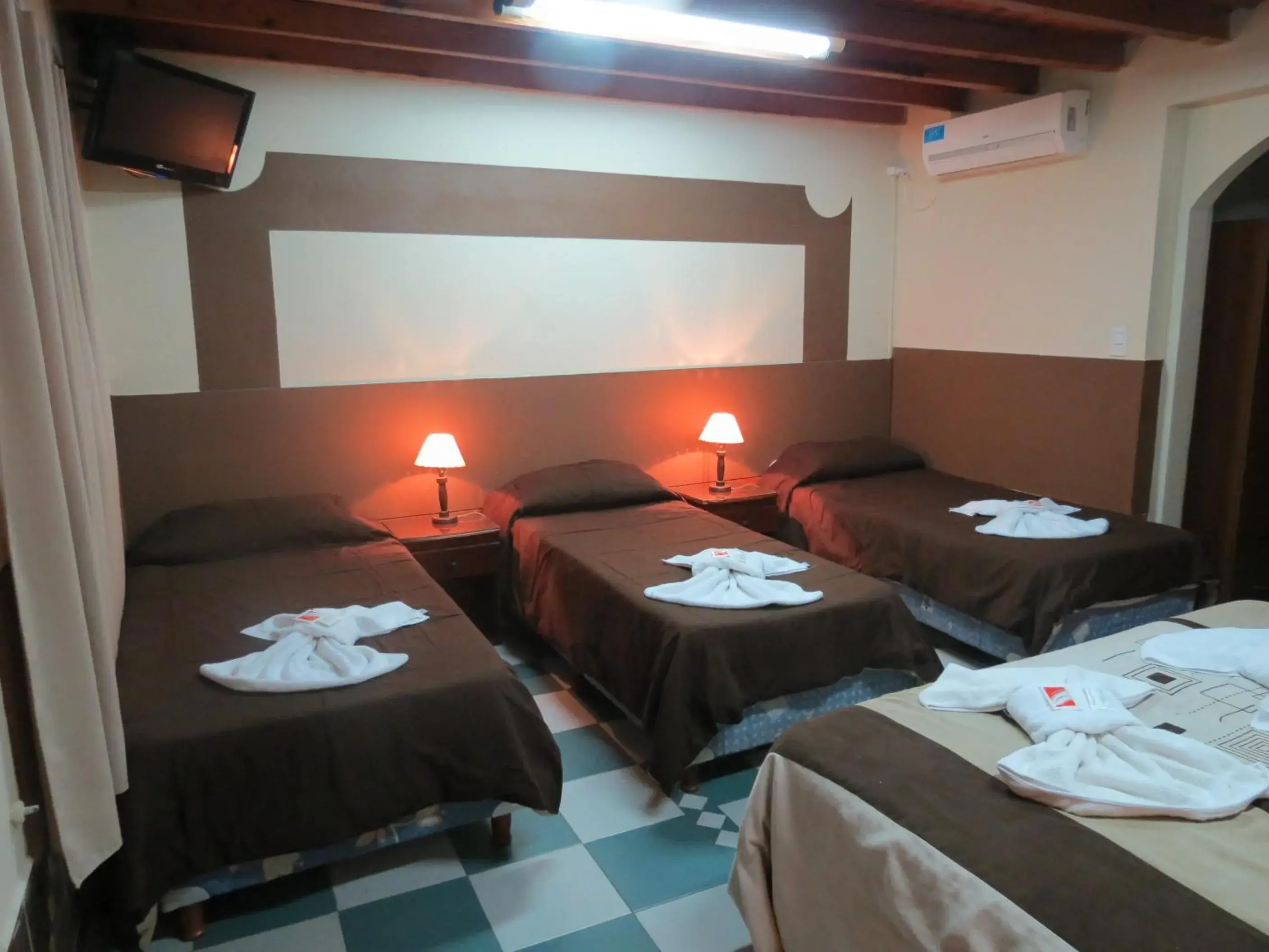 Quadruple Room in Hotel Pachá Quadruple Room in Hotel Pachá