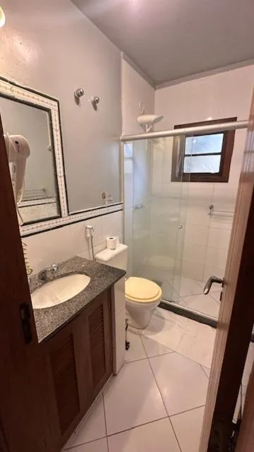 Shower in Pousada Casa das Rosas