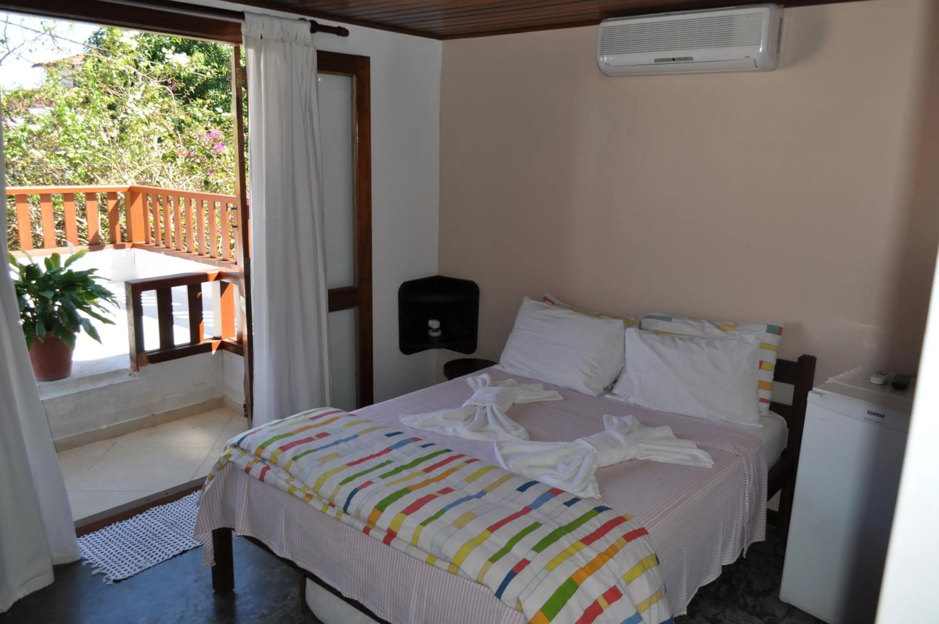 Bedroom, Bed in Pousada Casa das Rosas