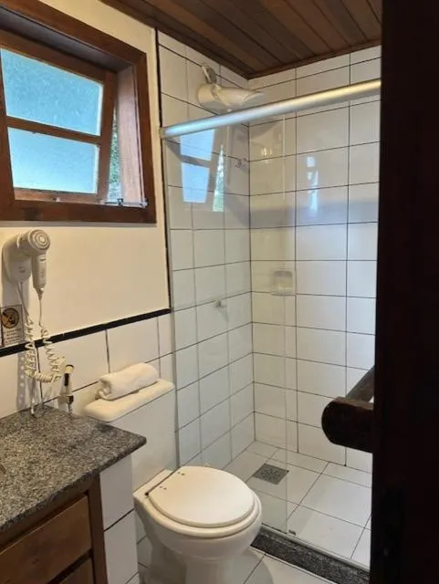 Shower in Pousada Casa das Rosas