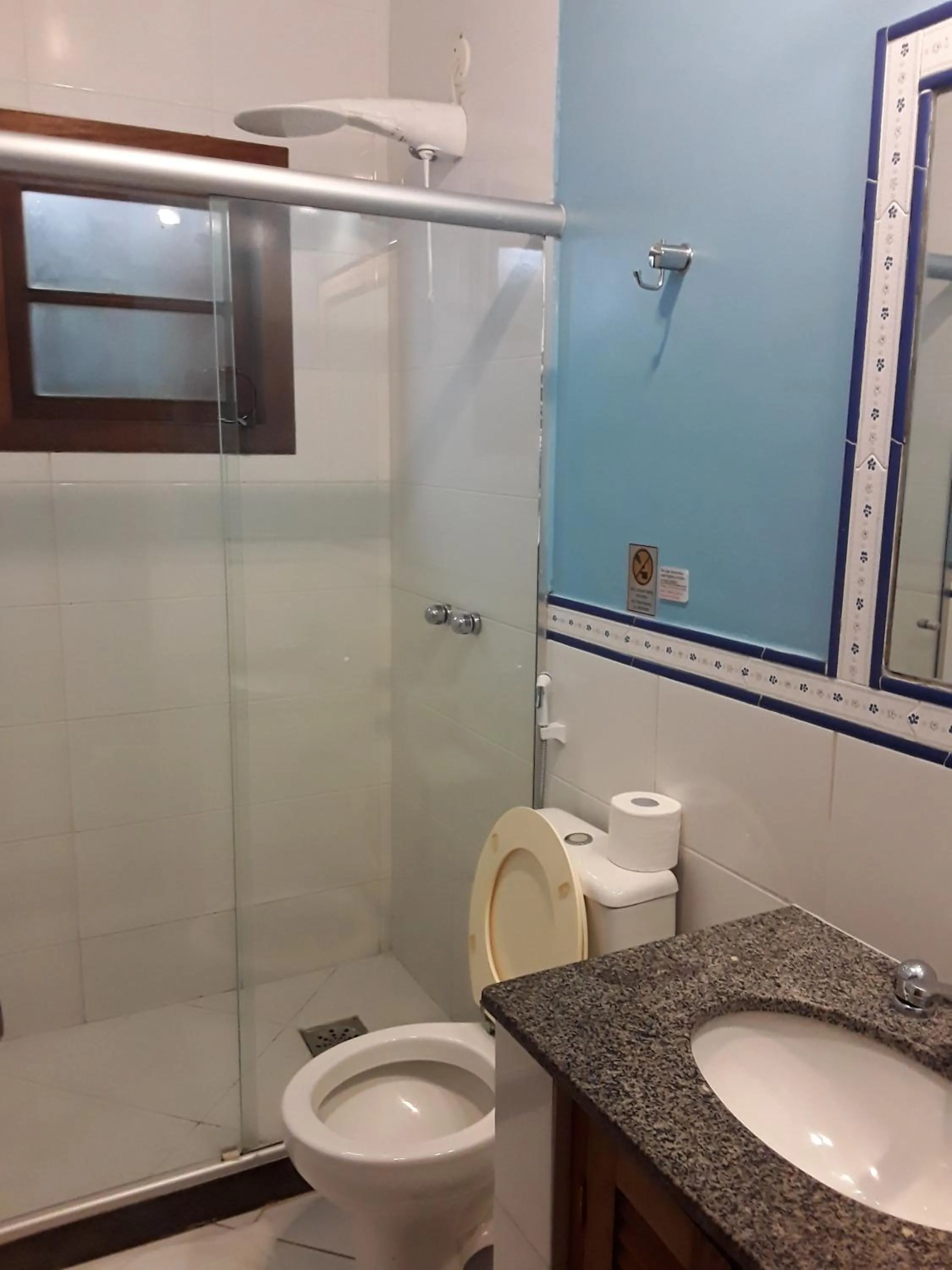 Bathroom in Pousada Casa das Rosas
