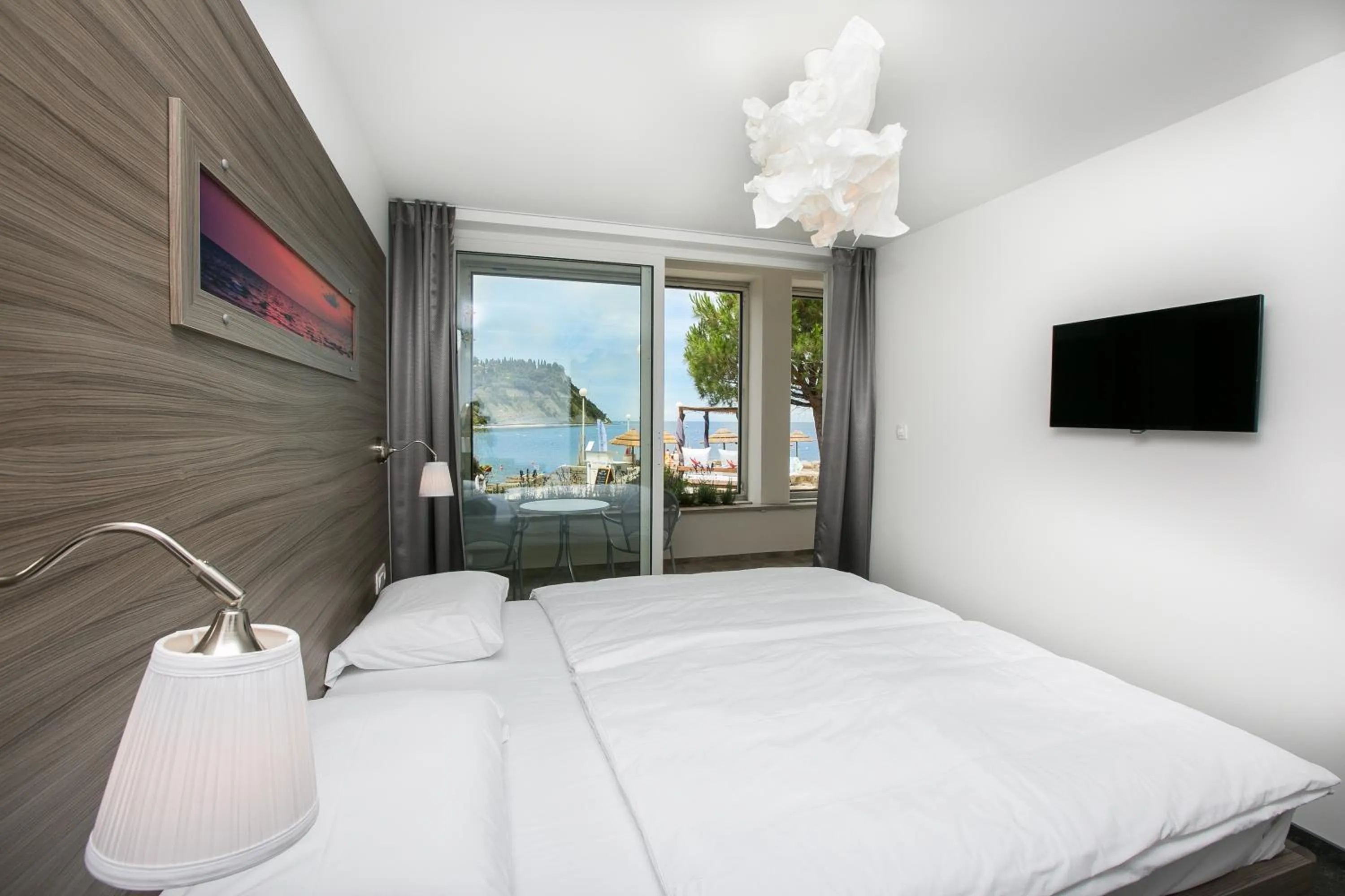 Photo of the whole room, Bed in Barbara Piran Beach Hotel