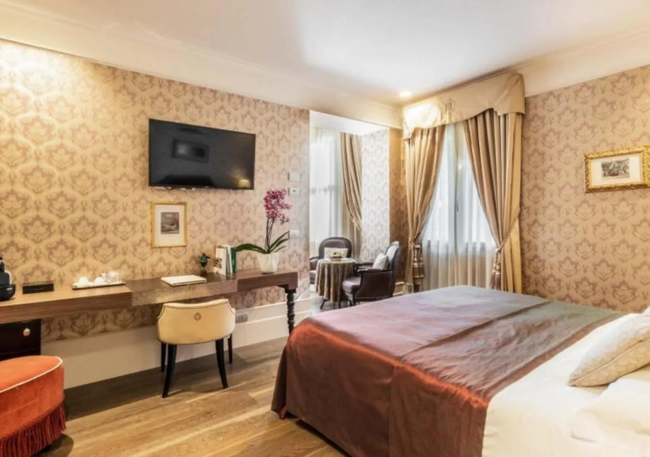 Bed in Hotel Moresco