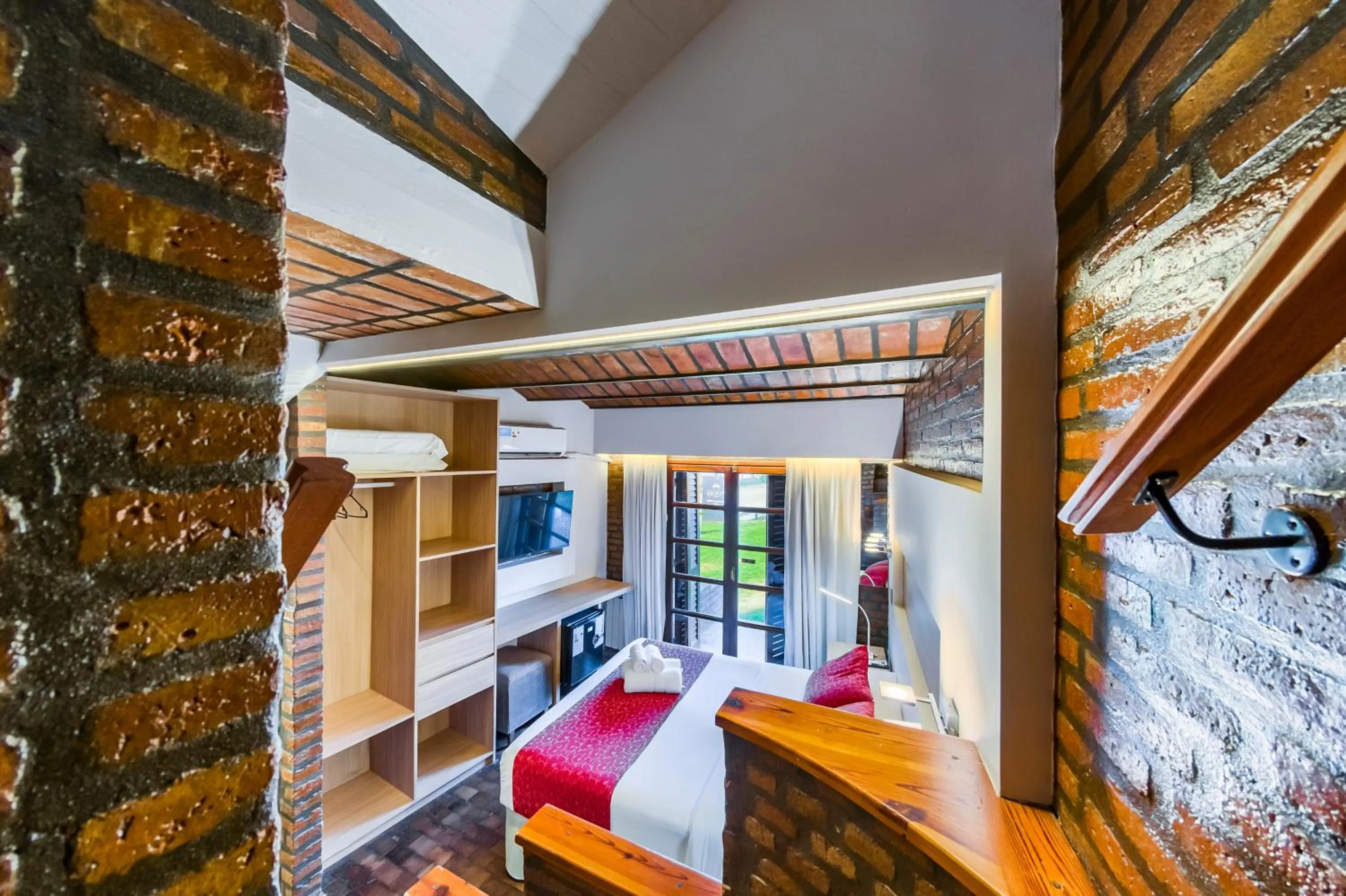 Bed in Portal del Lago Hotel