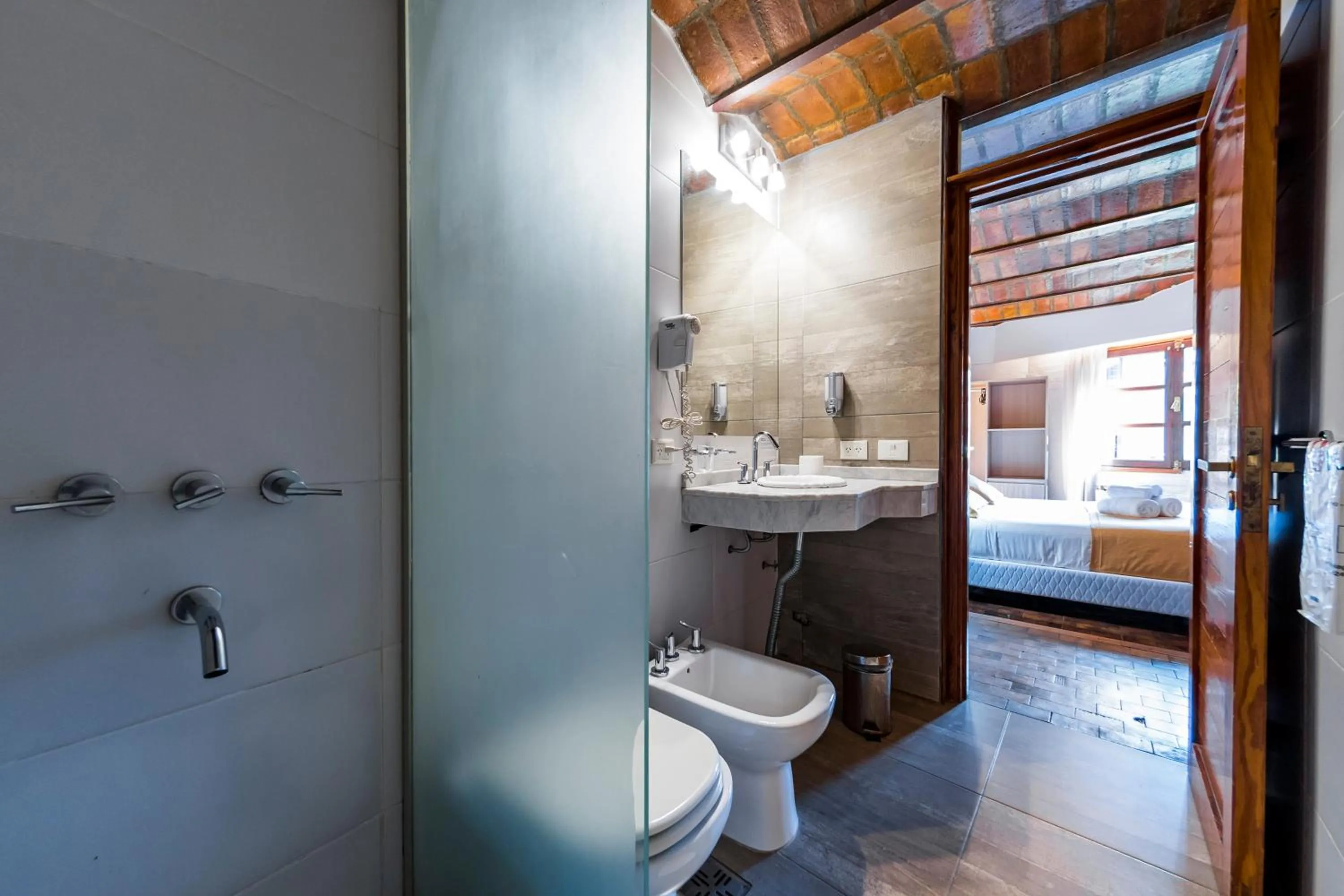 Bed in Portal del Lago Hotel