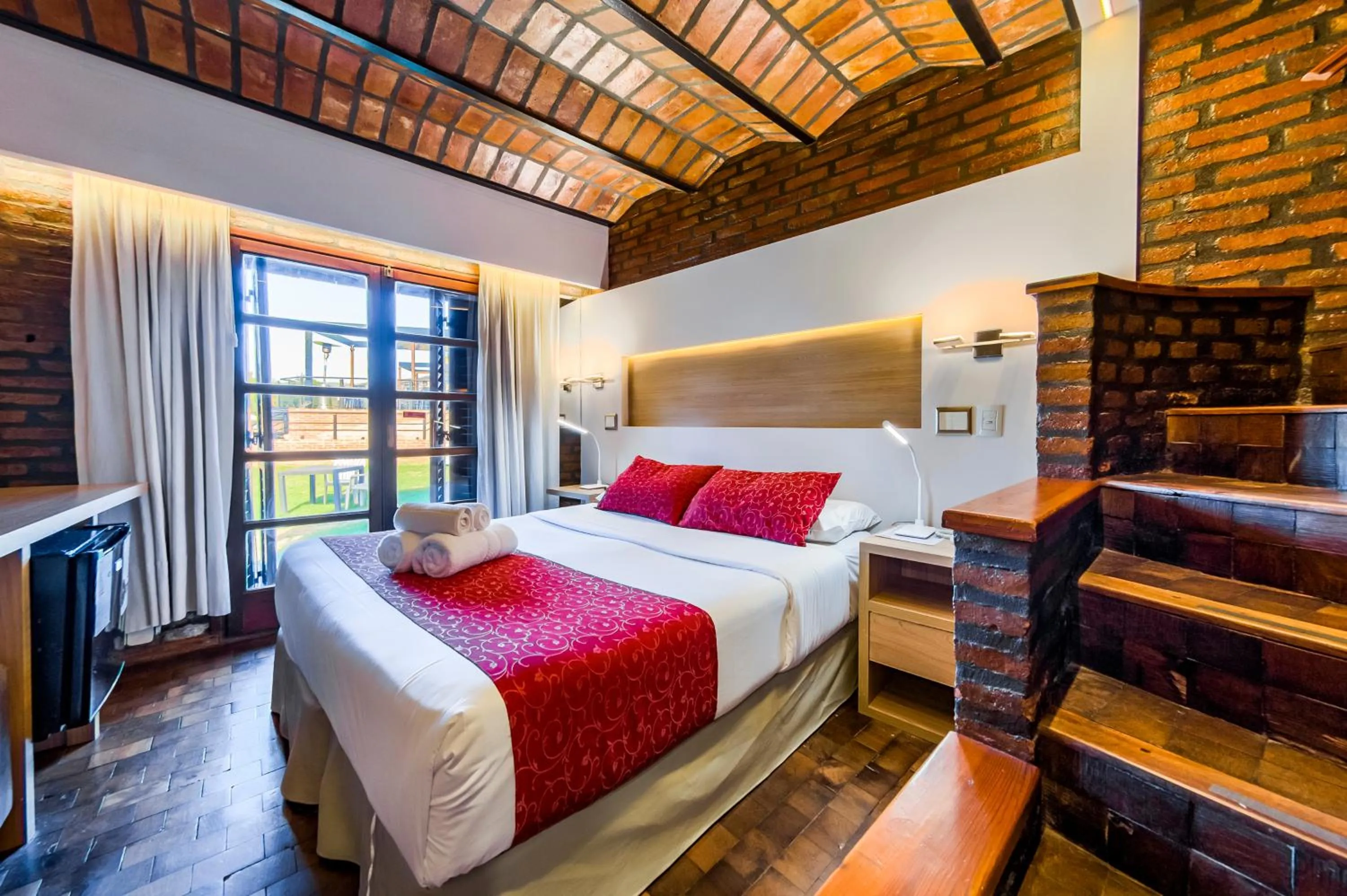 Bed in Portal del Lago Hotel