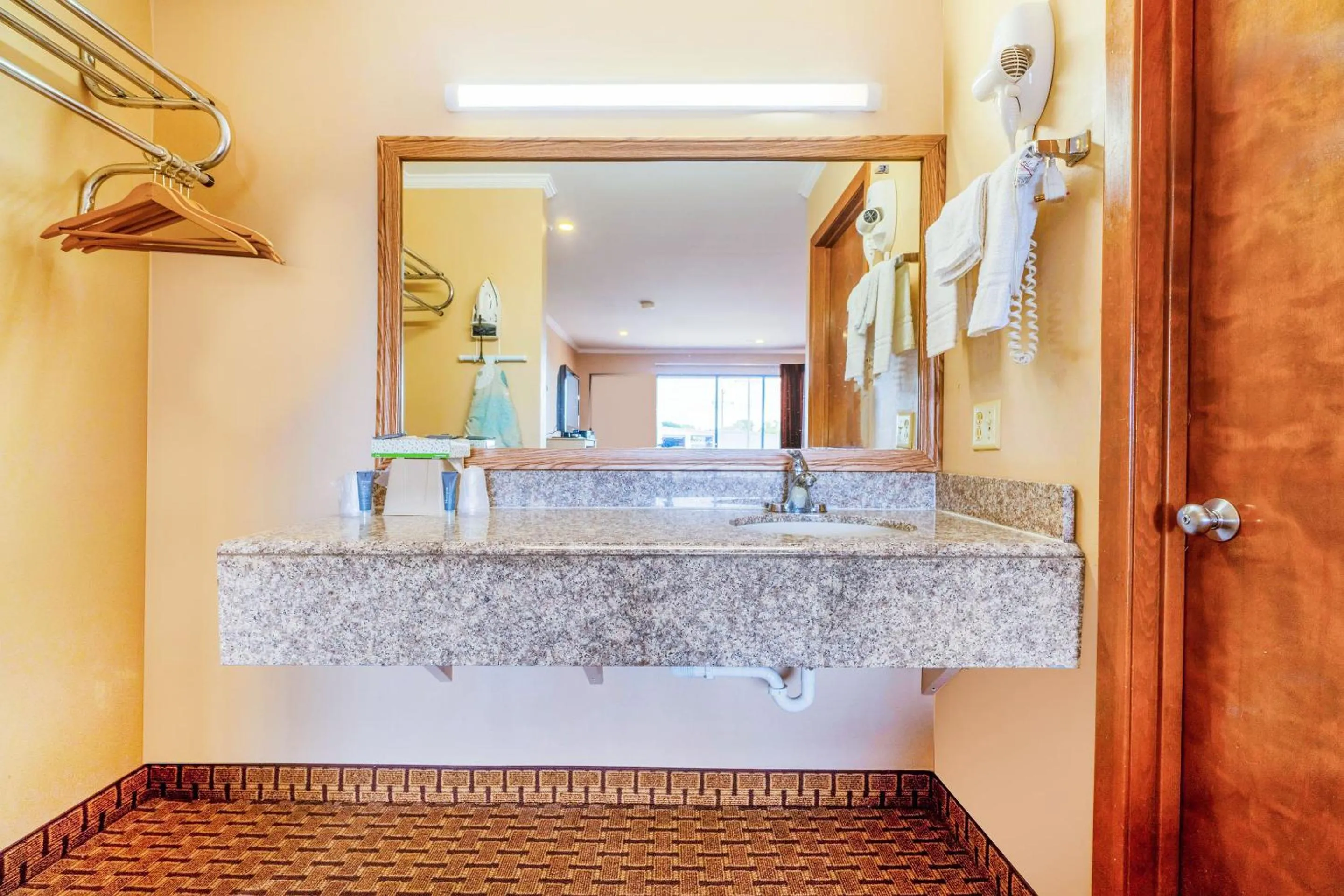 Bathroom in River Valley Motor Inn By OYO La Grange Texas