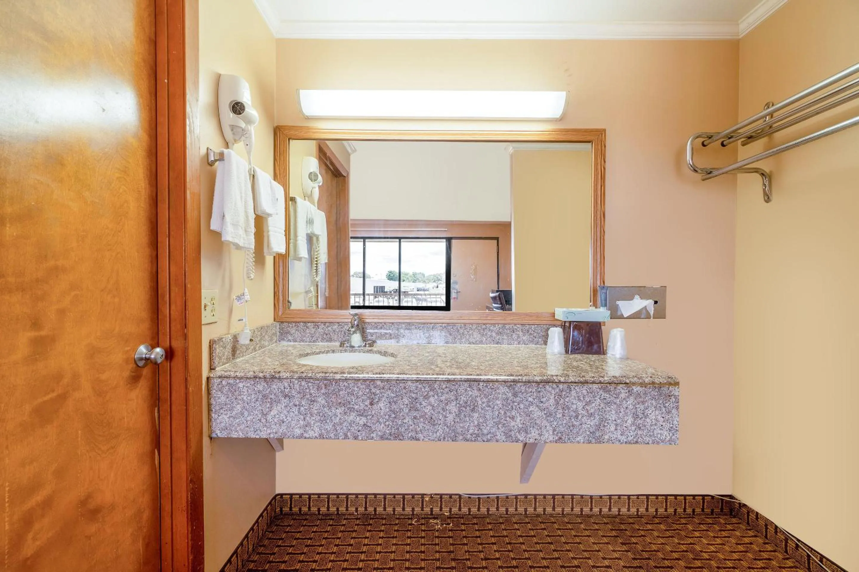 Bathroom in River Valley Motor Inn By OYO La Grange Texas