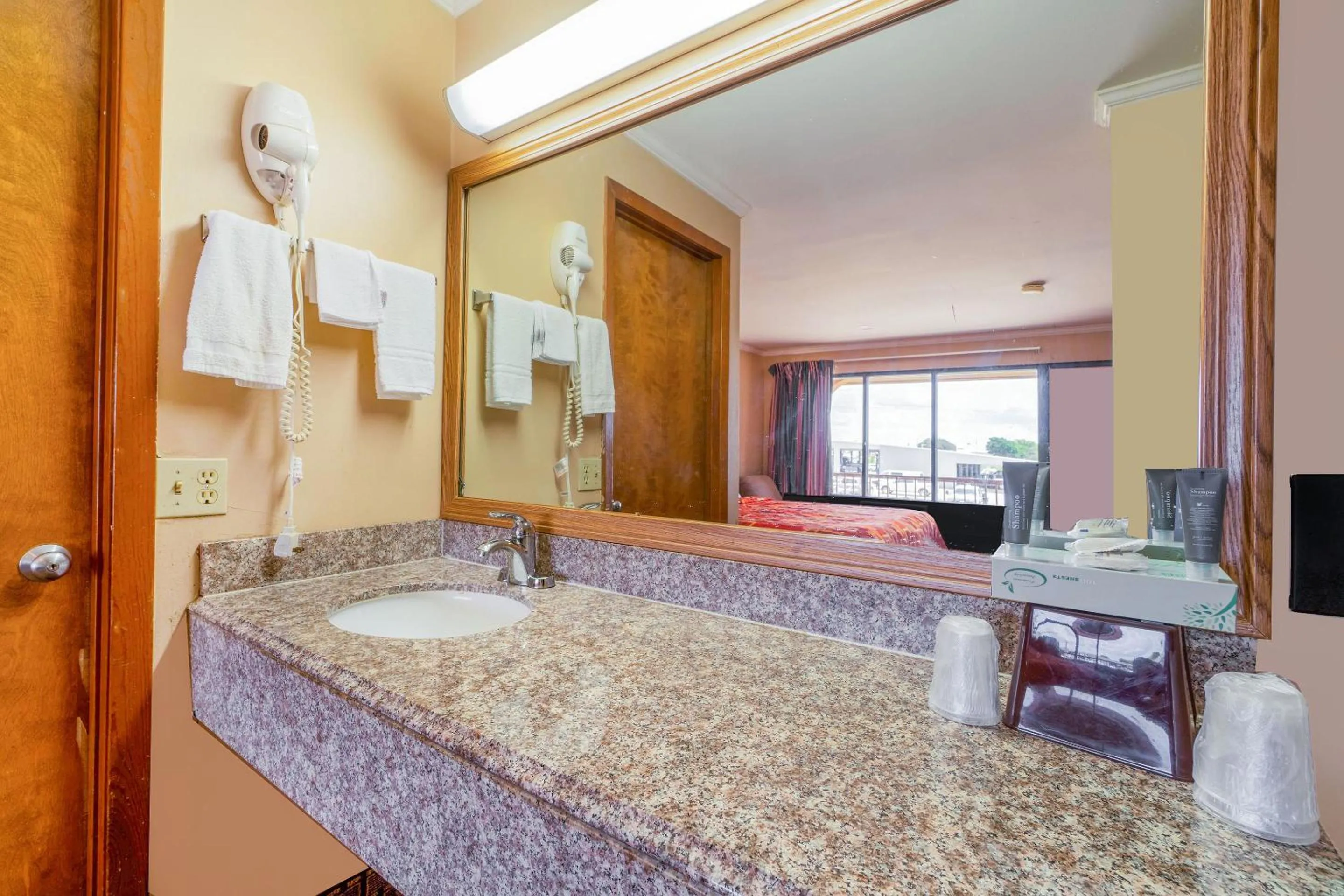 Bathroom in River Valley Motor Inn By OYO La Grange Texas