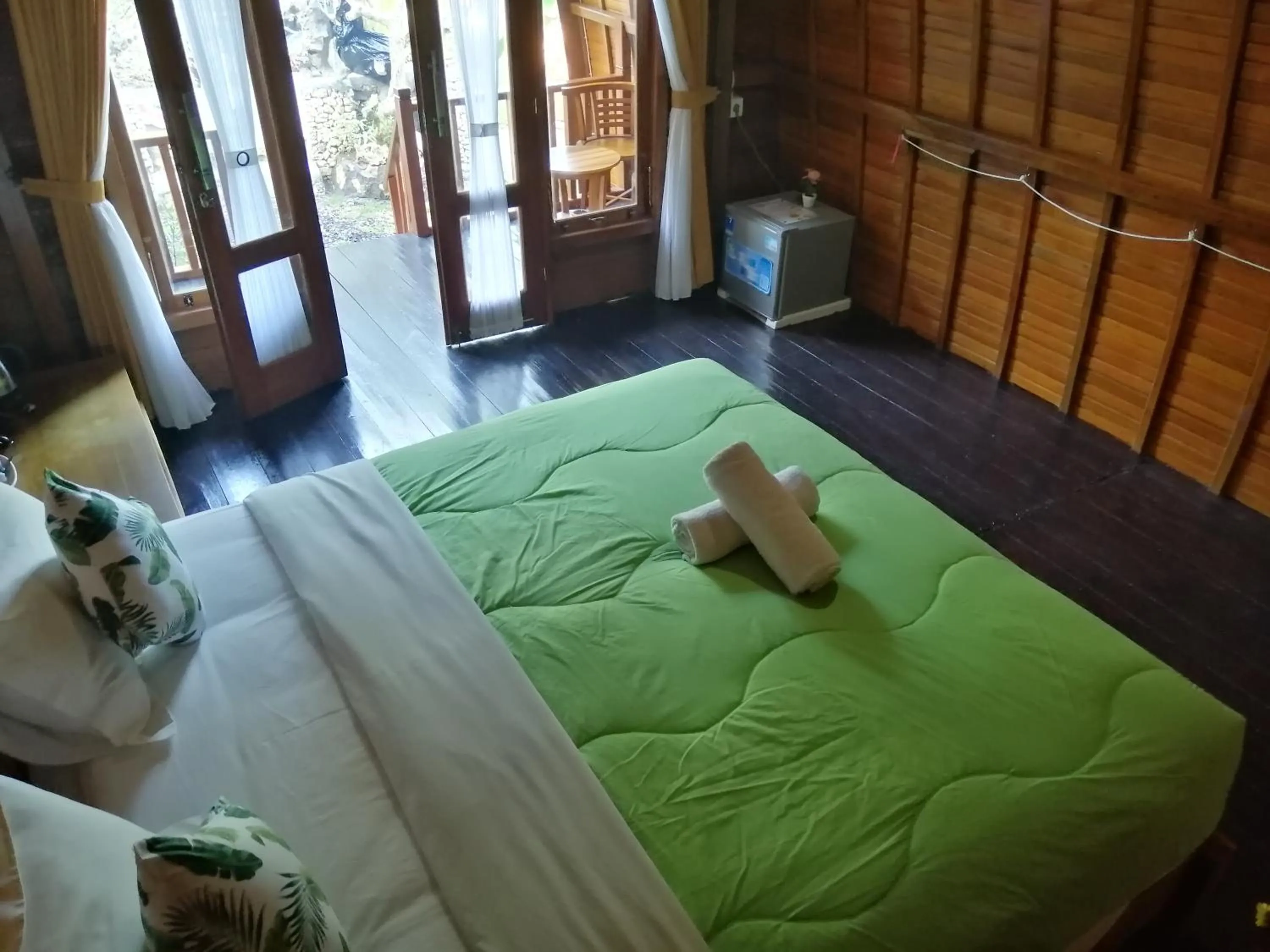 Bed in Ginanthi Cottage