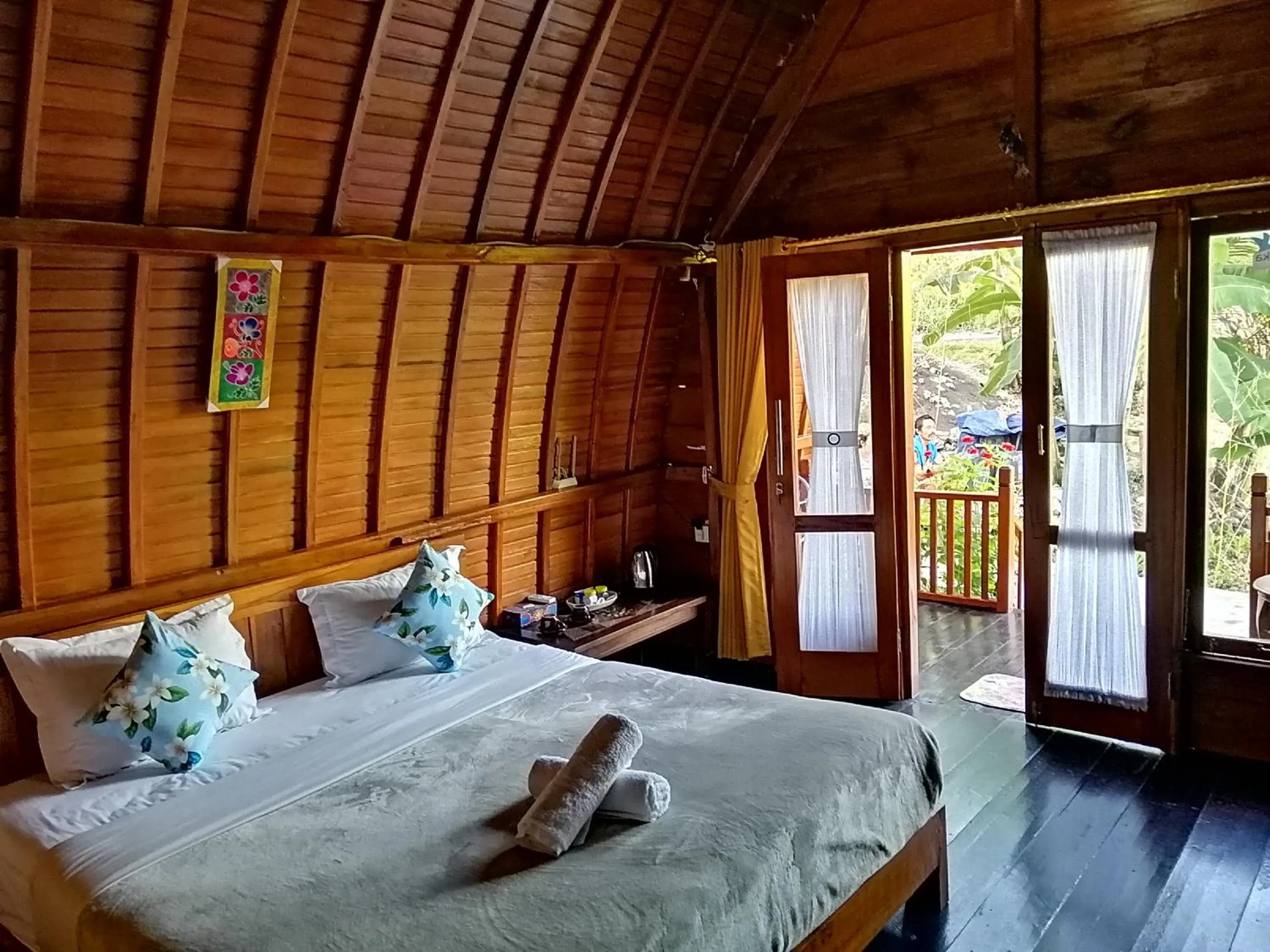Bed in Ginanthi Cottage