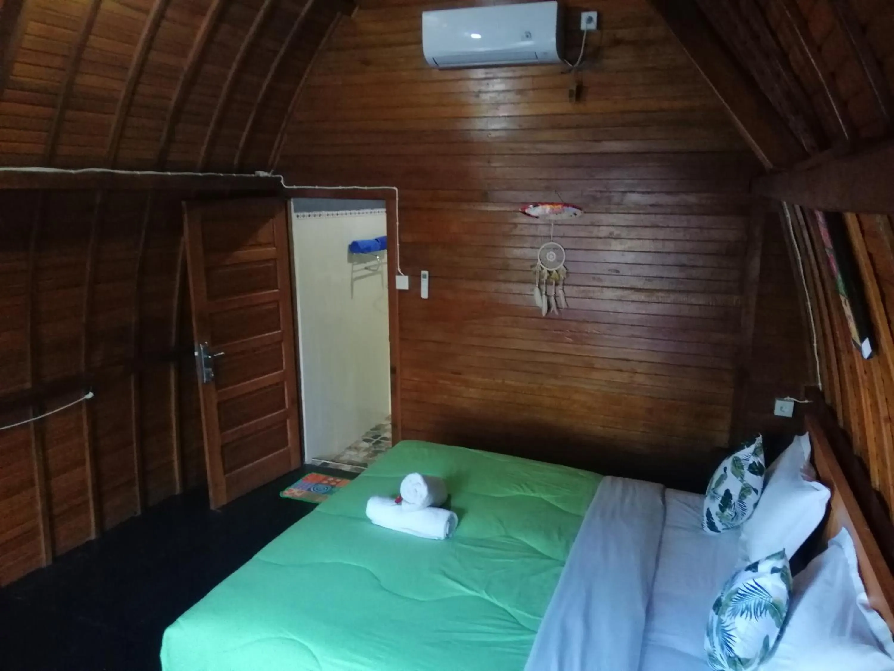 Bed in Ginanthi Cottage