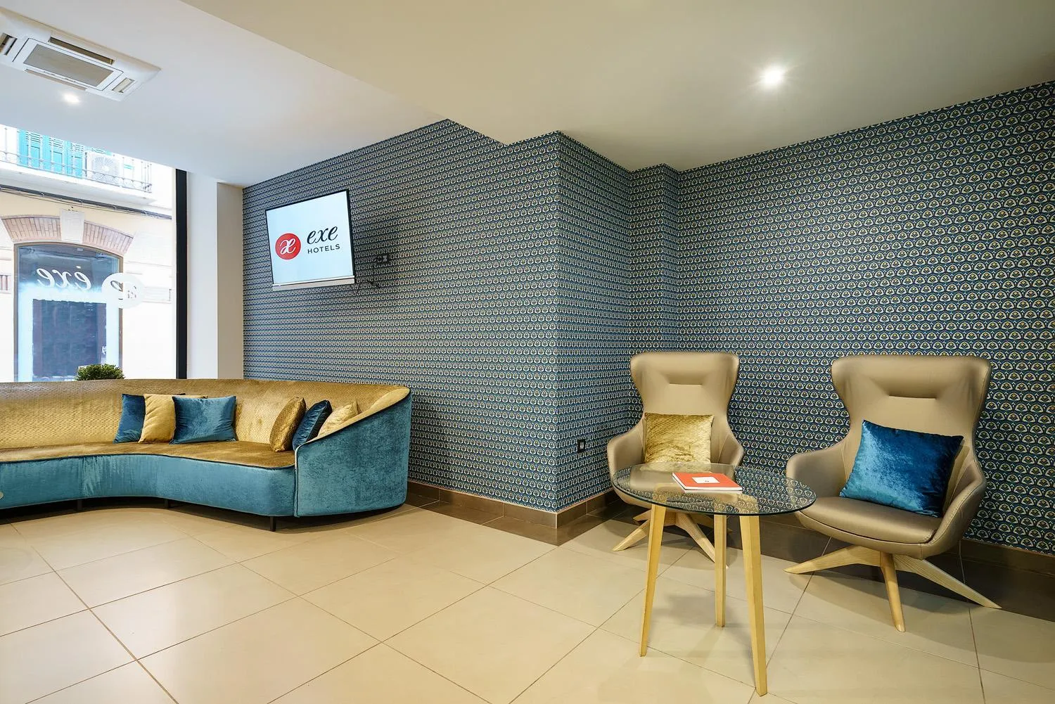 Lobby or reception in Exe Málaga Museos