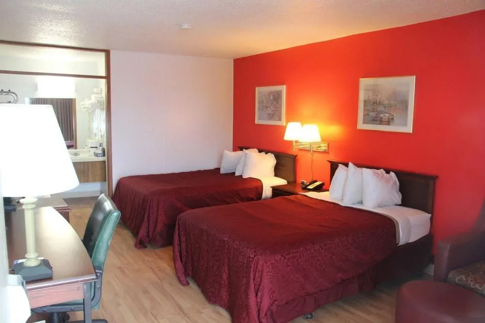 Bed in Norfolk Country Inn and Suites