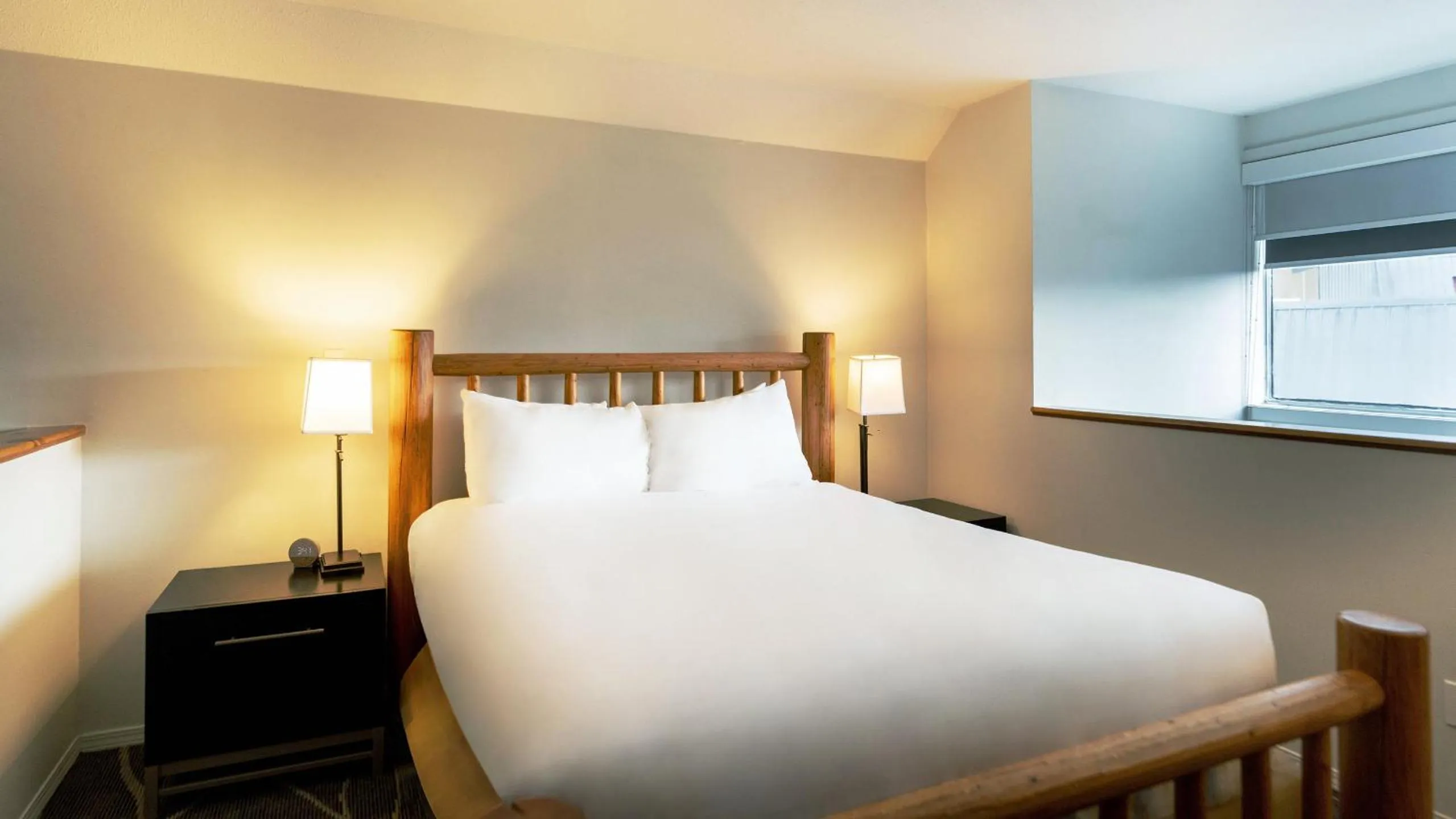 Bed in Mountain Side Hotel Whistler by Executive