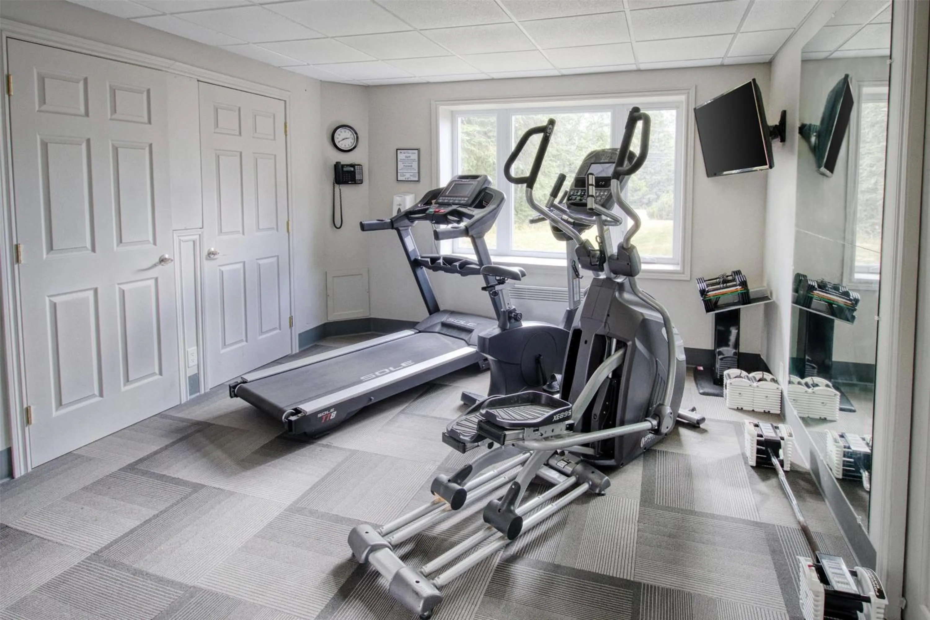 Fitness centre/facilities in Dannys Suites, SureStay Collection by Best Western