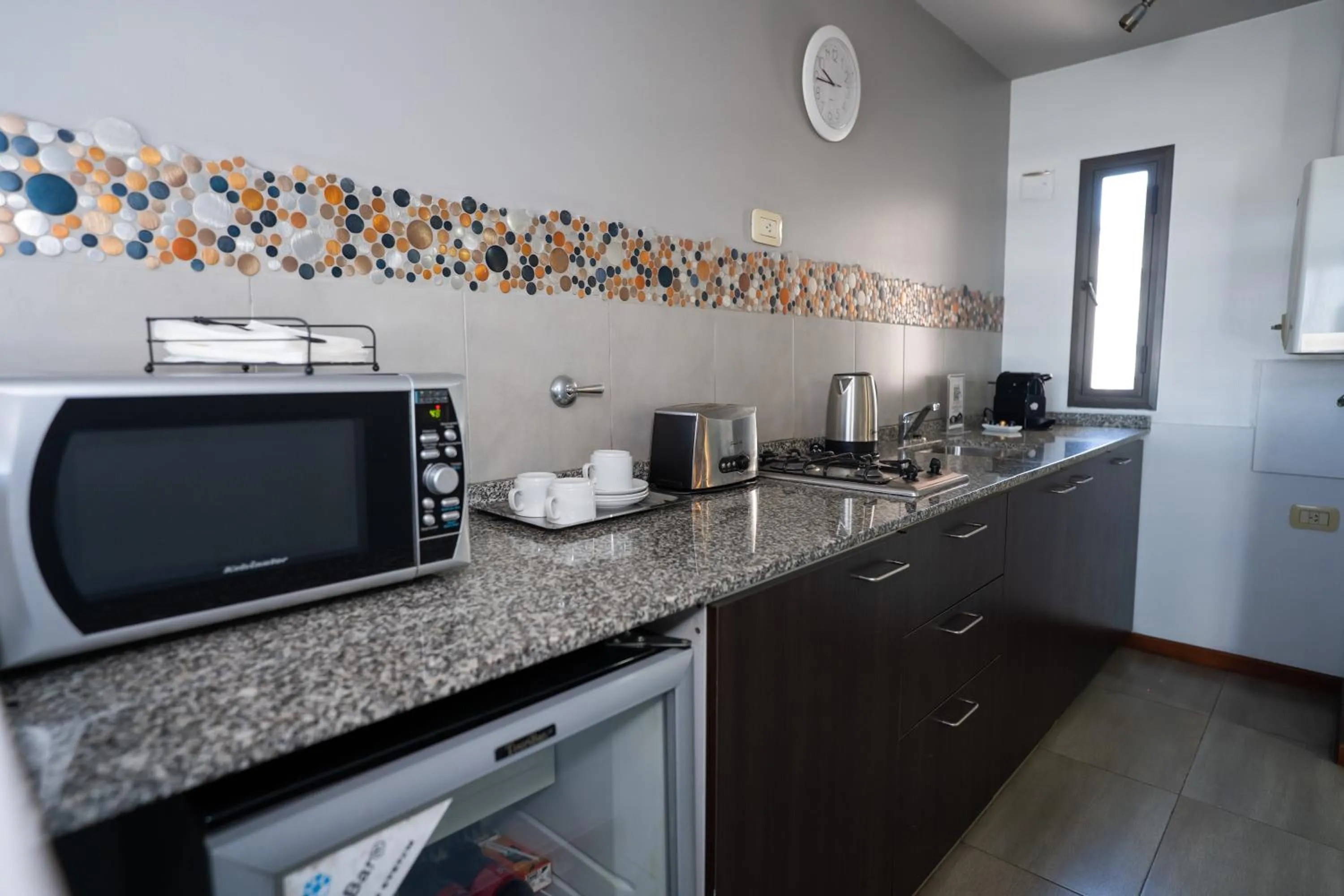 Kitchen or kitchenette in Kube Apartments Express