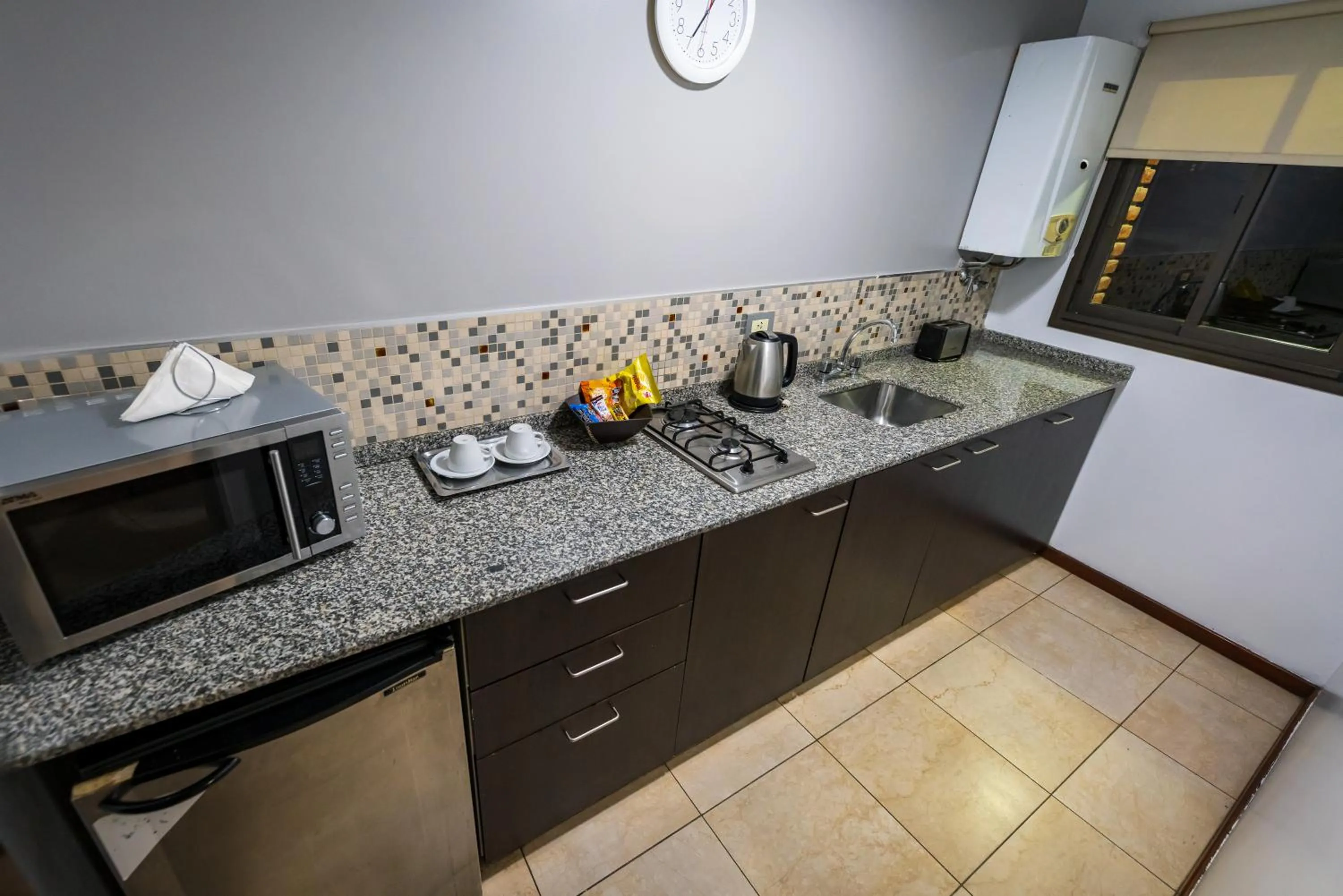 Kitchen or kitchenette in Kube Apartments Express